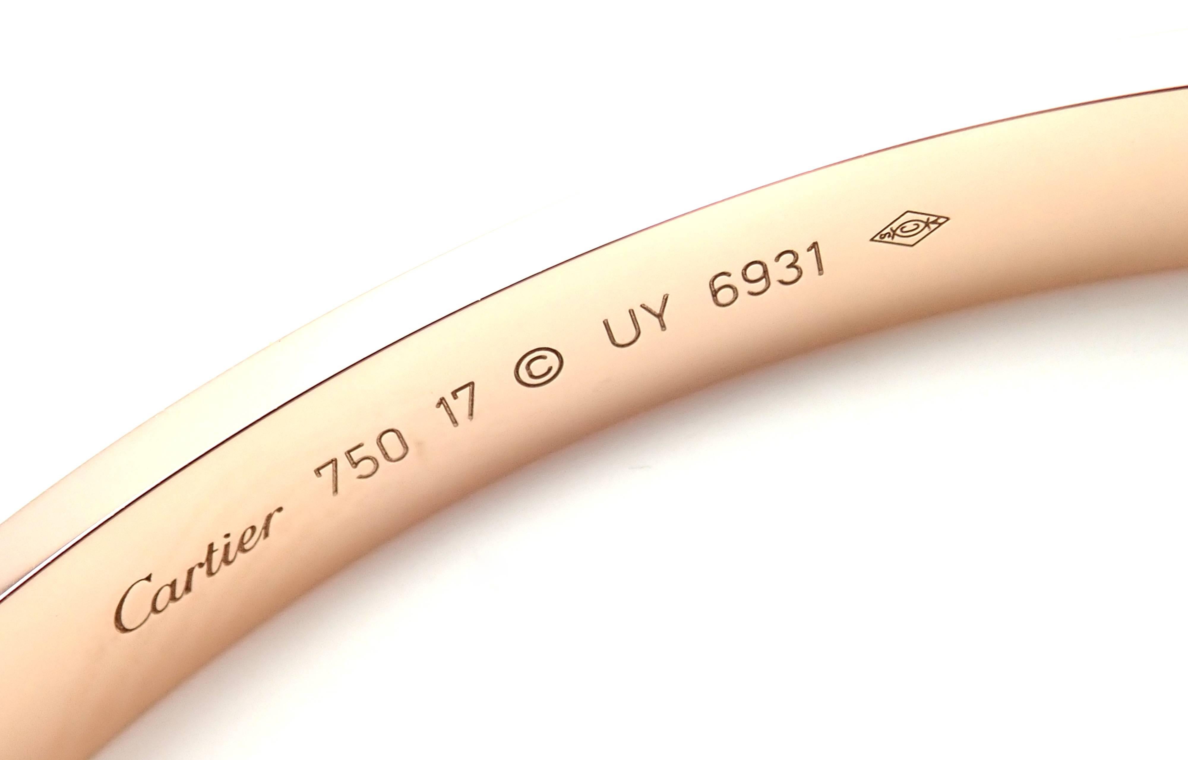 18k Rose Gold New Screw System Love Bangle Bracelet by Cartier. 
Size 17.  
This bracelet comes with Cartier service paper, screwdriver and Cartier box.
Details: 
Size: 17 
Weight: 29.6 grams
Width: 6.5mm 
Hallmarks: Cartier 750 17 UY6931
*Free