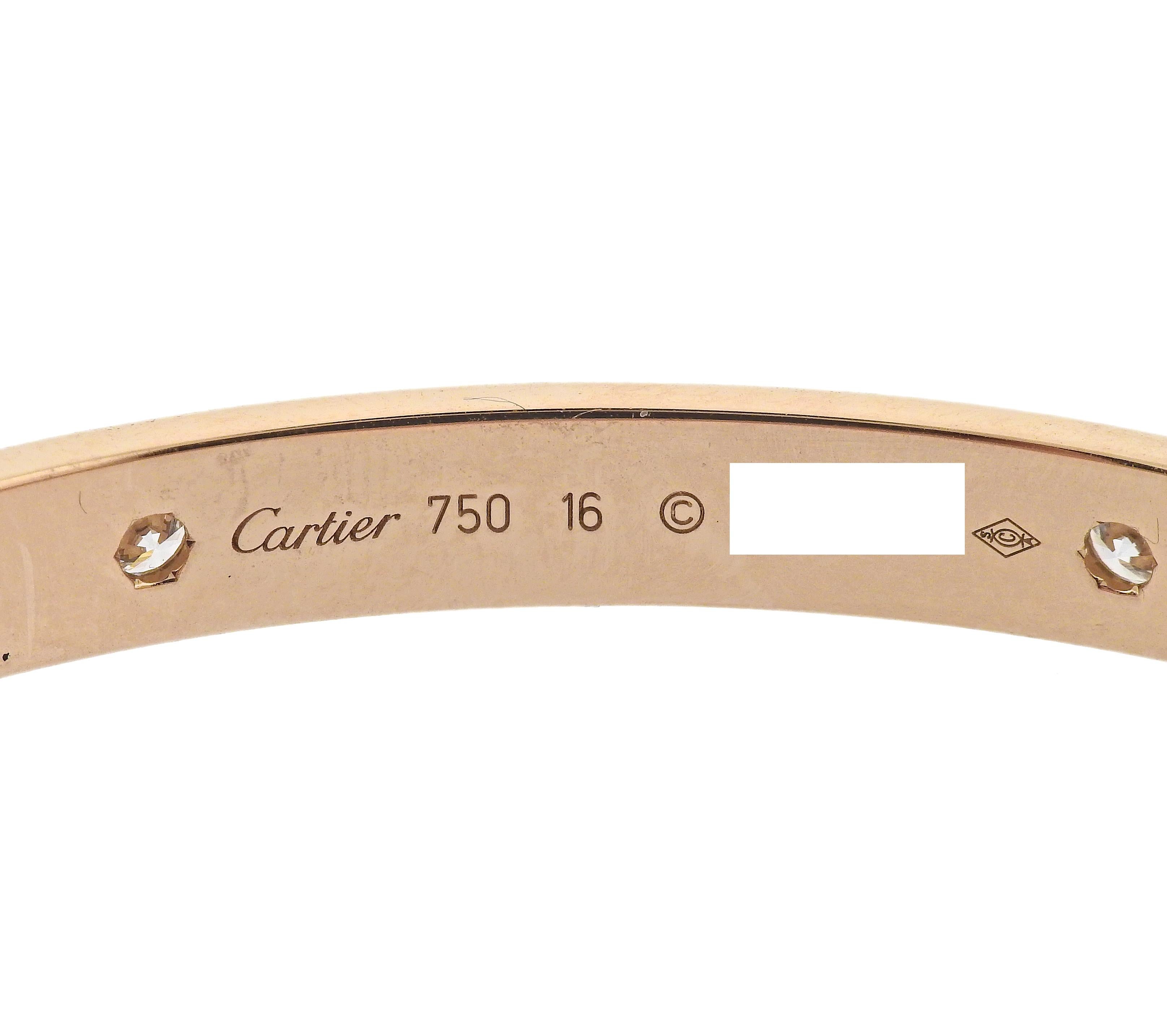 18k rose gold iconic Love bangle bracelet by Cartier, in size 16, with 0.42ctw G/VS diamonds . Comes with box and screwdriver. Retail $11000. Bracelet is Cartier size 16, width 6mm. Marked Cartier, 750, XA7***, 16. Weight 28.7 grams.