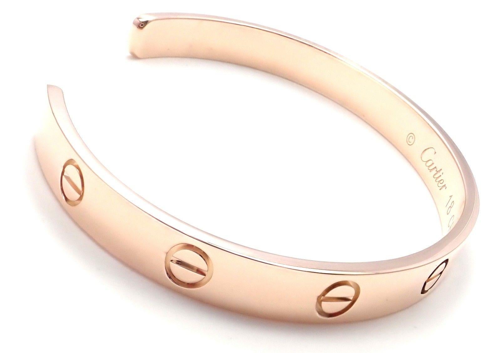 18k Rose Gold Cartier Love Open Cuff Bangle Bracelet. Size 18.
This bracelet comes with Cartier certificate, box and a receipt from 2017.
Details:
Length: 18cm
Weight: 24.1 grams
Width: 6.5mm
Hallmarks: Cartier 750 18 CRA897
*Free Shipping within