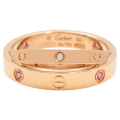 Anello Cartier Love in oro rosa con zaffiro e diamante