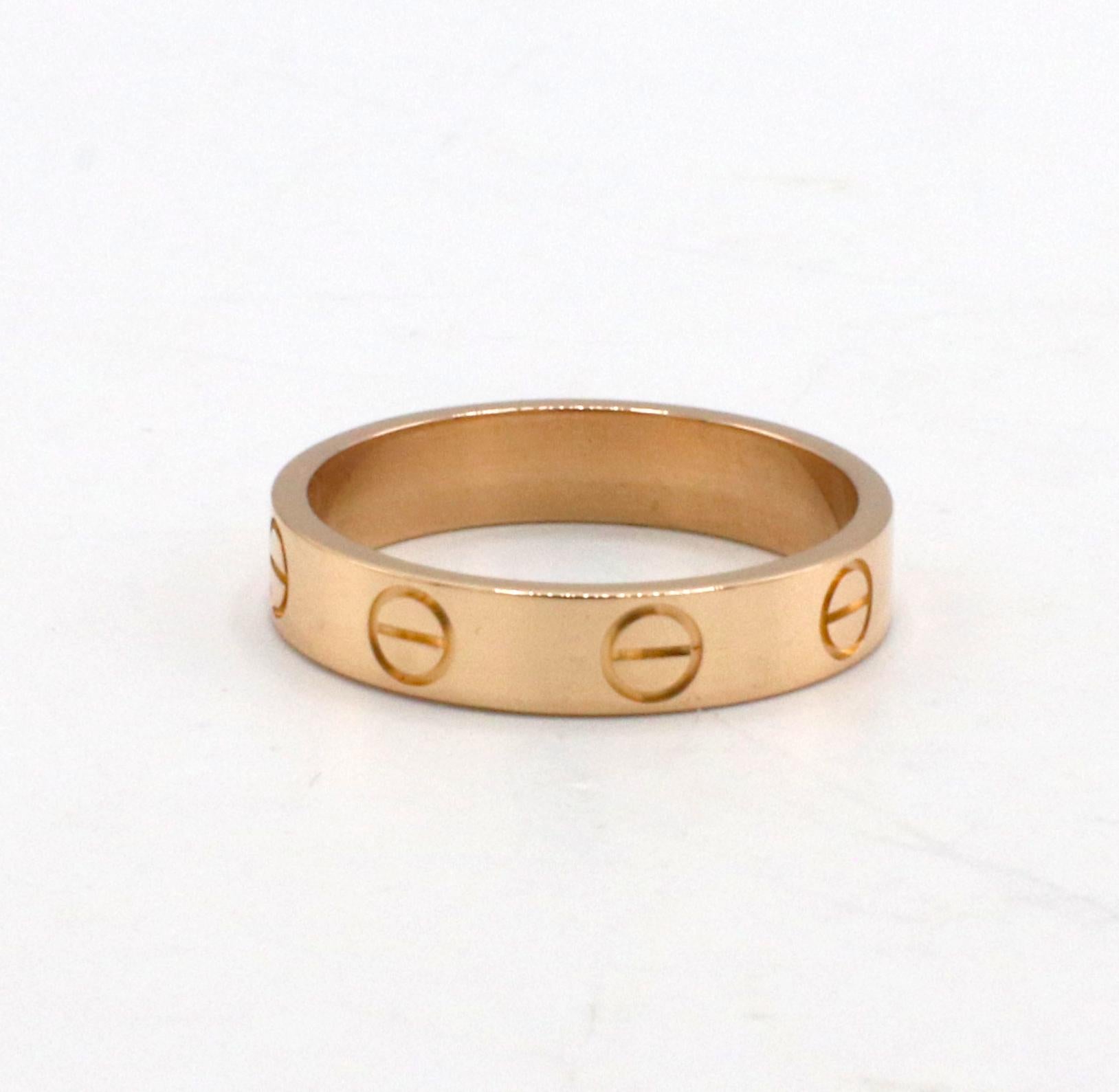 Cartier Love Rose Gold Wedding Band Ring 
Metal: 18k rose gold
Weight: 3.1 grams
Width: 3.6mm
Size: 49 (4.75 US)
Box & Papers
Retail: $1,170 USD

