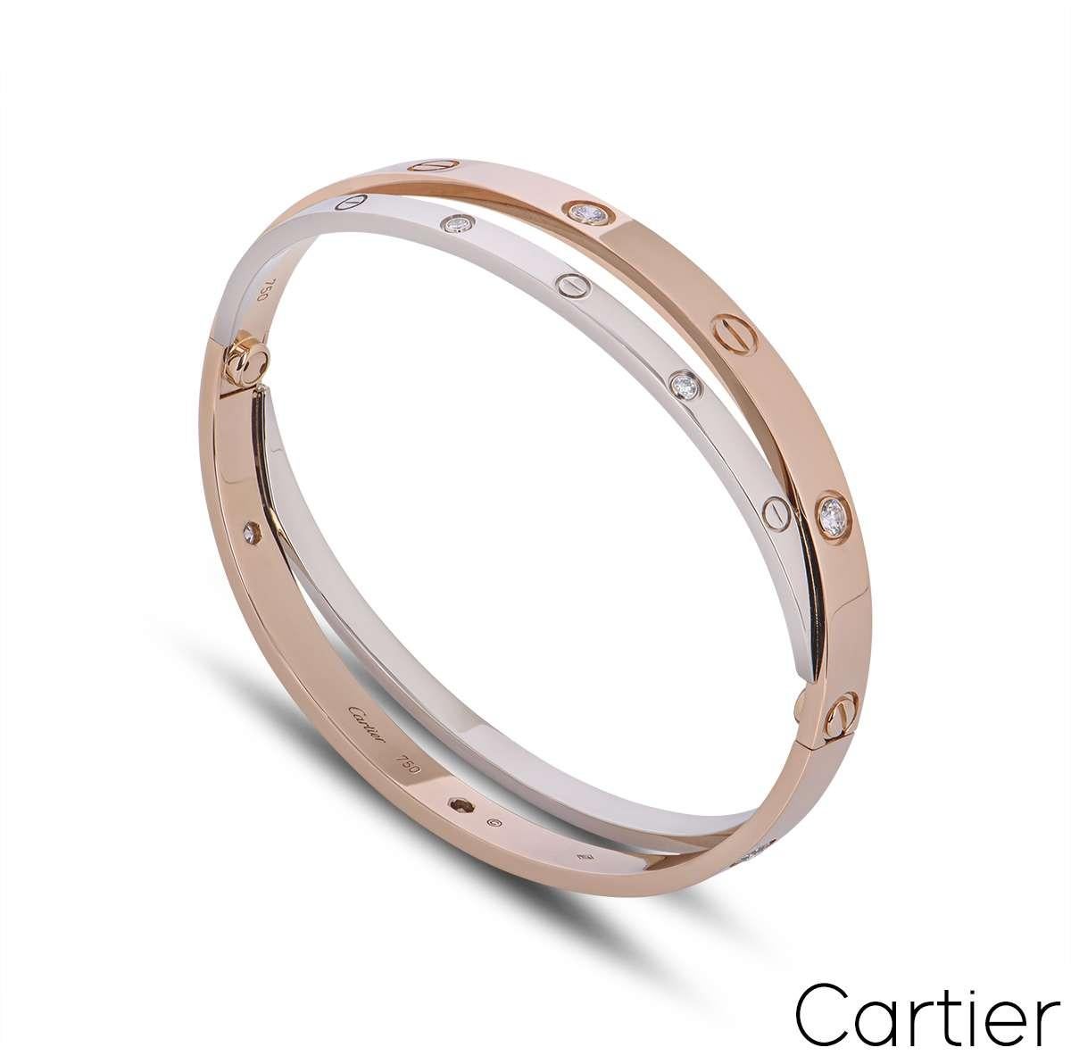 A stunning 18k double rose and white gold diamond bangle by Cartier from the Love collection. The rose gold bangle is set with 6 round brilliant cut diamonds and alternating screw motifs, interlinking with it is a white gold band on either side also