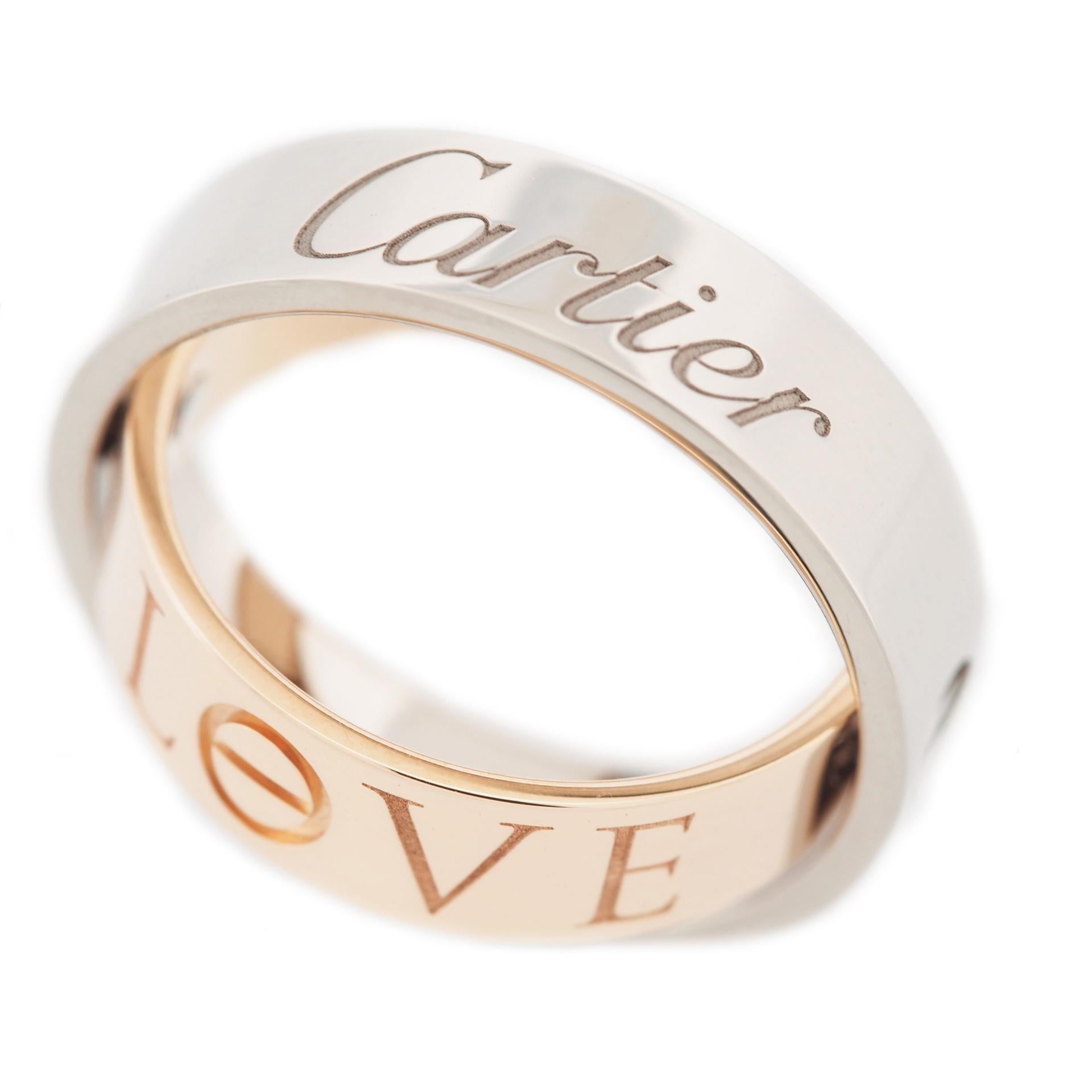 Item: Authentic Cartier Love Secret Ring ( 2005 Limited Edition )
Stones: ---
Metal: 18K Rose & White Gold
Ring Size: 53 US SIZE 6.25 UK SIZE M 1/4
Internal Diameter:  16.85 mm
Measurement:  5.5 mm width
Weight:  11.1 Grams
Condition: Used