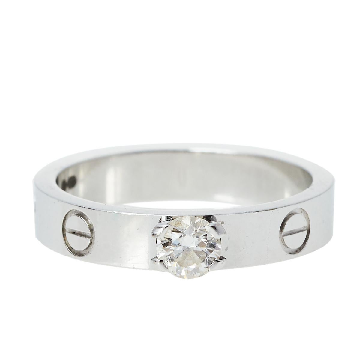 One of the most iconic and loved designs from the house of Cartier, the stunning Love ring is an icon of style and luxury. Constructed in 18K white gold, this Love Solitaire ring features the signature screw details all around the surface and is