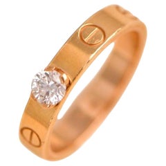 Cartier, bague solitaire LOVE en or rose et diamants, taille 52