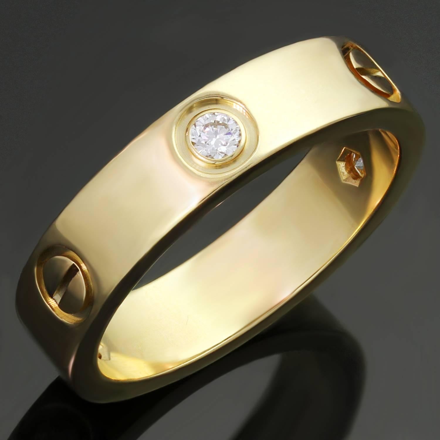 This fabulous ring from the iconic Love collection is crafted in 18k yellow gold and bezel-set with 3 brilliant-cut round diamonds of an estimated 0.22 carats. Made in France circa 2014. Measurements: 0.19