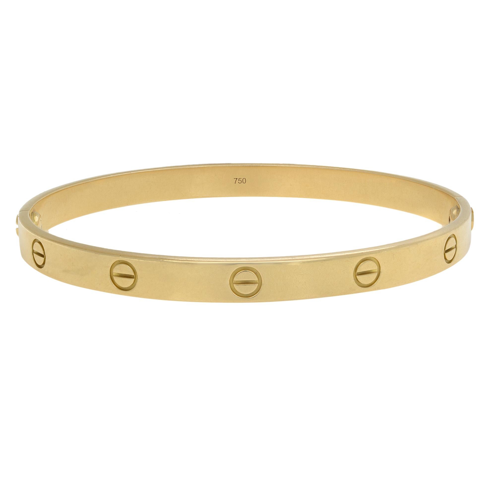 Cartier classic Love bracelet in 18K yellow gold. Size 21. Old style screw system. Width: 6.1mm. Great pre-owned condition. Comes with Cartier box and screw driver. Papers are not included.