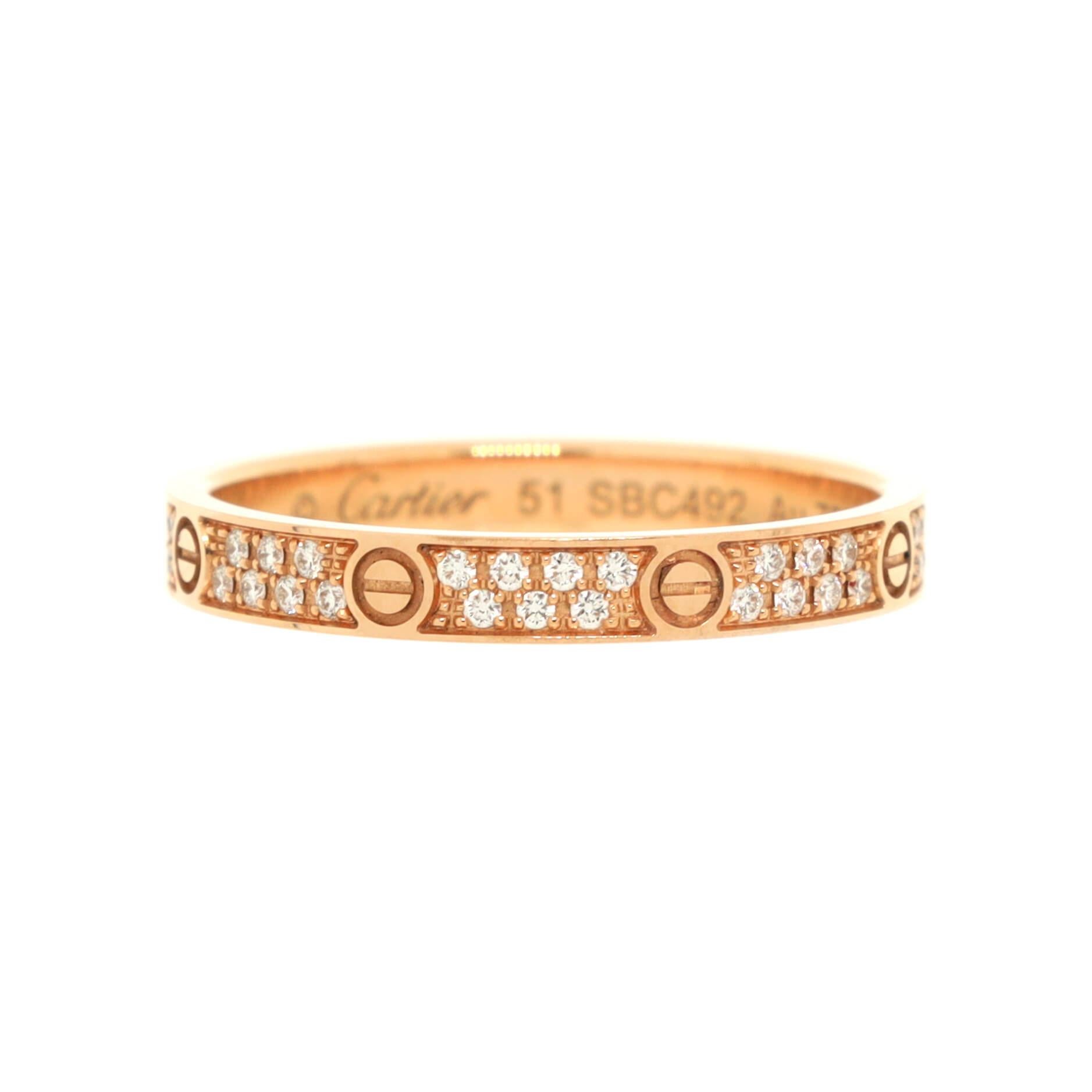 Condition: Excellent. Faint wear throughout.
Accessories: No Accessories
Measurements: Size: 5.75 - 51, Width: 2.60 mm
Designer: Cartier
Model: Love Wedding Band Pave Diamonds Ring 18K Rose Gold and Diamonds Small
Exterior Color: Rose Gold
Item