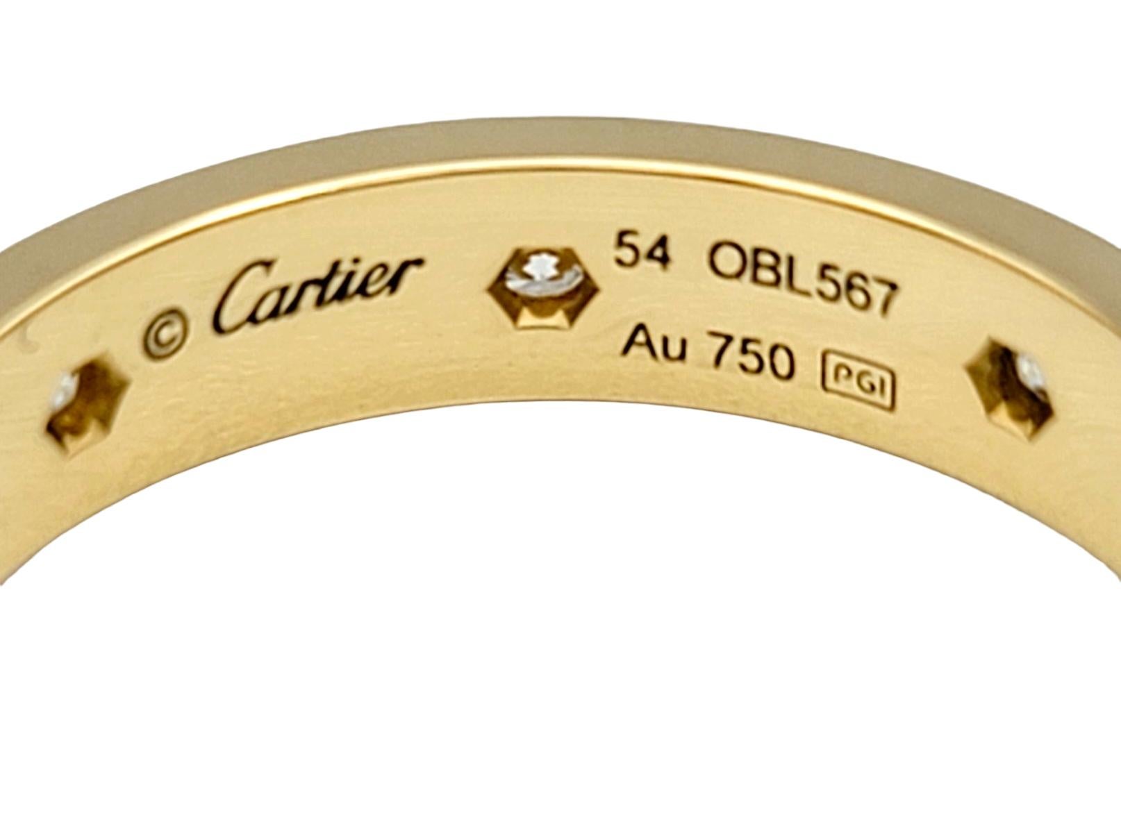 Women's Cartier Love Wedding Band Ring with Diamonds Set in 18 Karat Yellow Gold For Sale