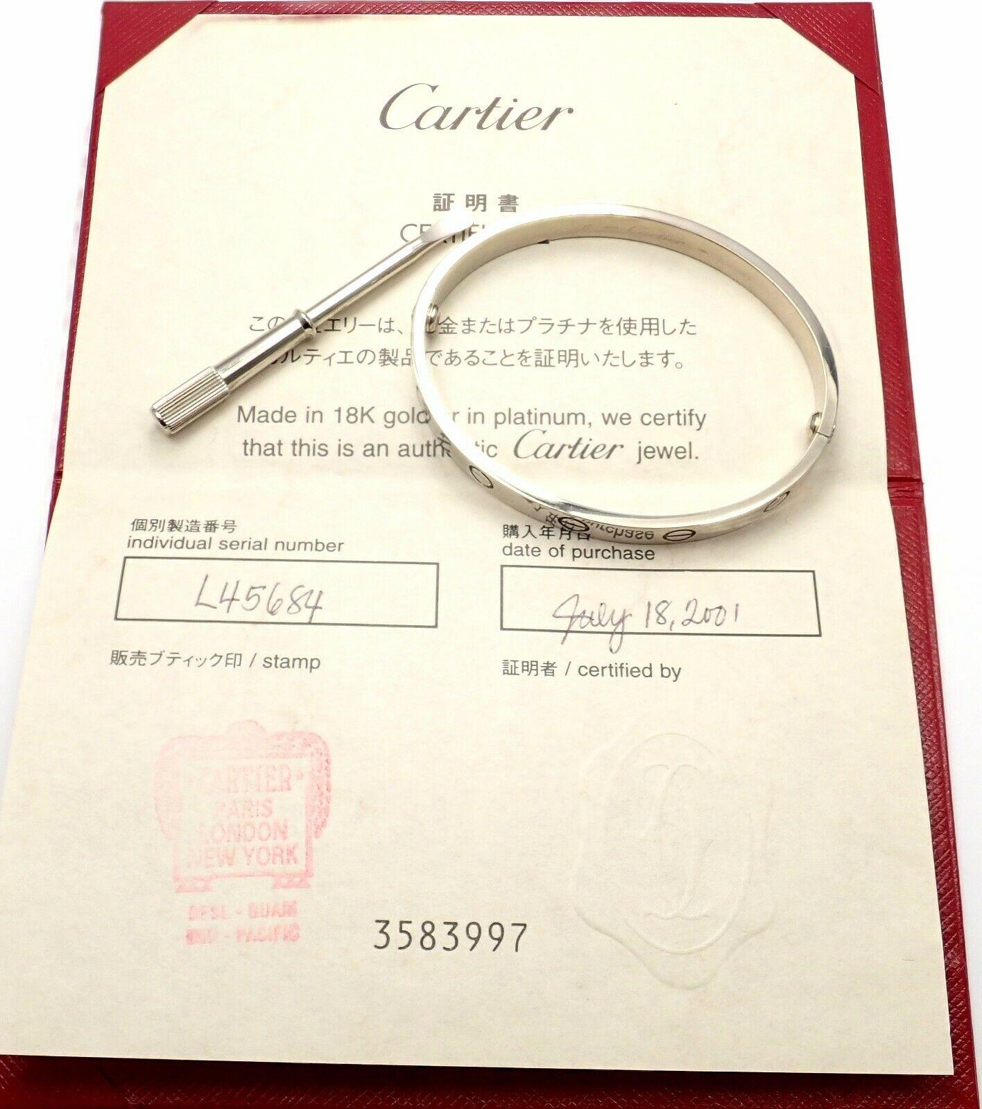 18k White Gold Love Bangle Bracelet by Cartier. Size 17. 
This bracelet comes with Cartier certificate, Cartier box and Cartier screwdriver.
Details: Size: 17 
Weight: 34.6 grams
Width: 6.5mm 
Hallmarks: Cartier 750 17 1993 L45684
*Free Shipping