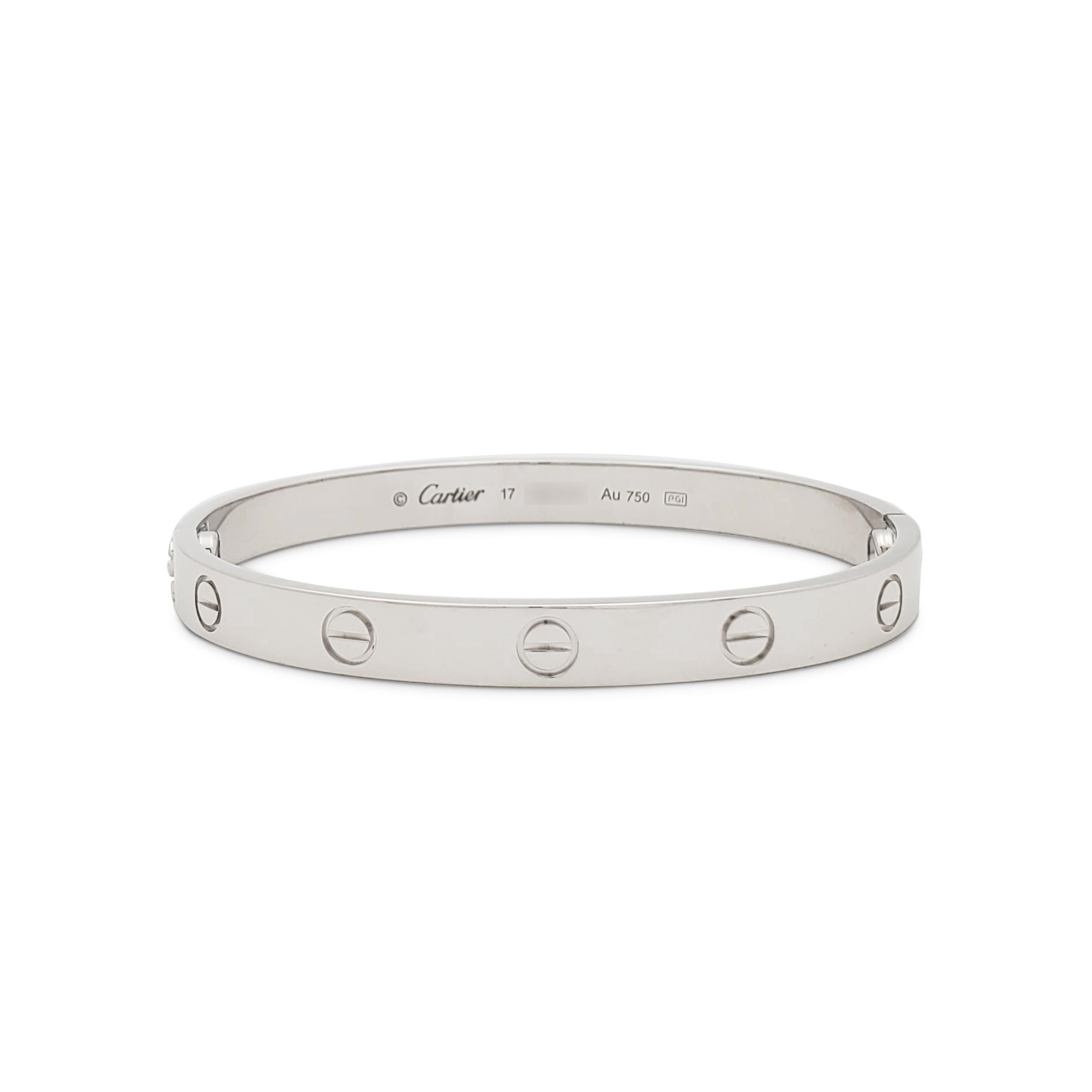 Authentic Cartier 'Love' bracelet crafted in 18 karat white gold. Size 17. Signed Cartier, 17, Au750, with serial number and hallmarks. New screw system.  The bracelet is presented with the original papers, no box. CIRCA 2010s

Brand: