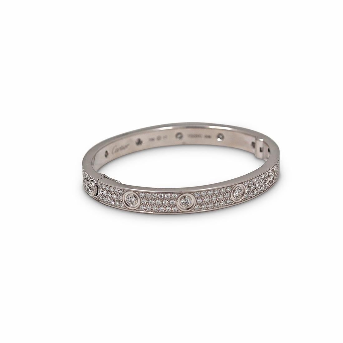 Authentic Cartier ''Love'' bangle bracelet crafted in 18 karat white gold with diamond screw tops and pave set round brilliant cut diamonds (D-F in colour, VVS clarity) for an estimated 3.15 carats total weight. Size 17. Signed Cartier, 17, 750,