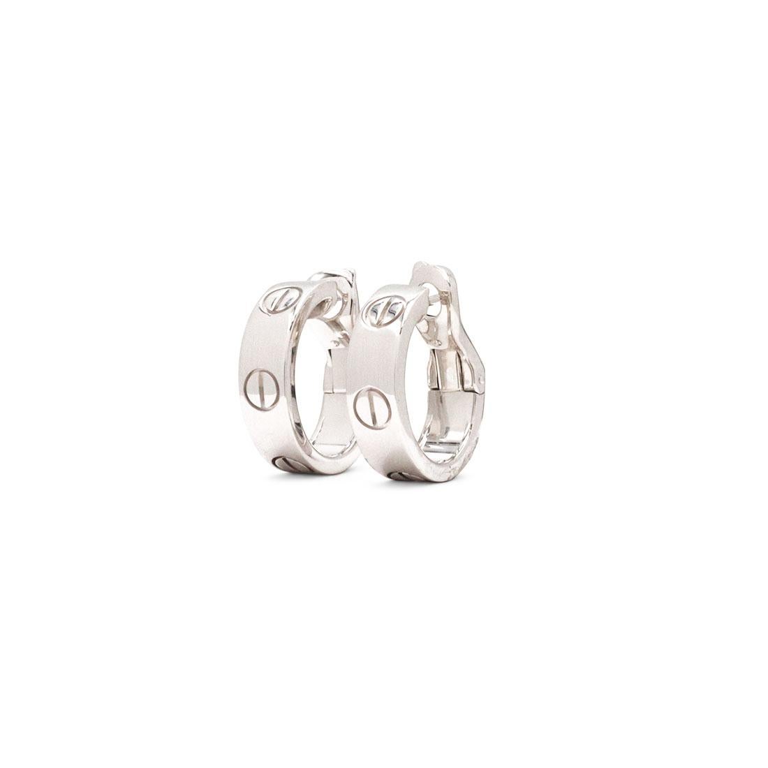 Authentic Cartier 'Love' earrings crafted in 18 karat white gold. Signed Cartier, 750, with serial number and hallmark. The earrings are presented with the original papers not with the box. CIRCA 2010s.

Brand: Cartier
Collection: Love
Metal: 18K