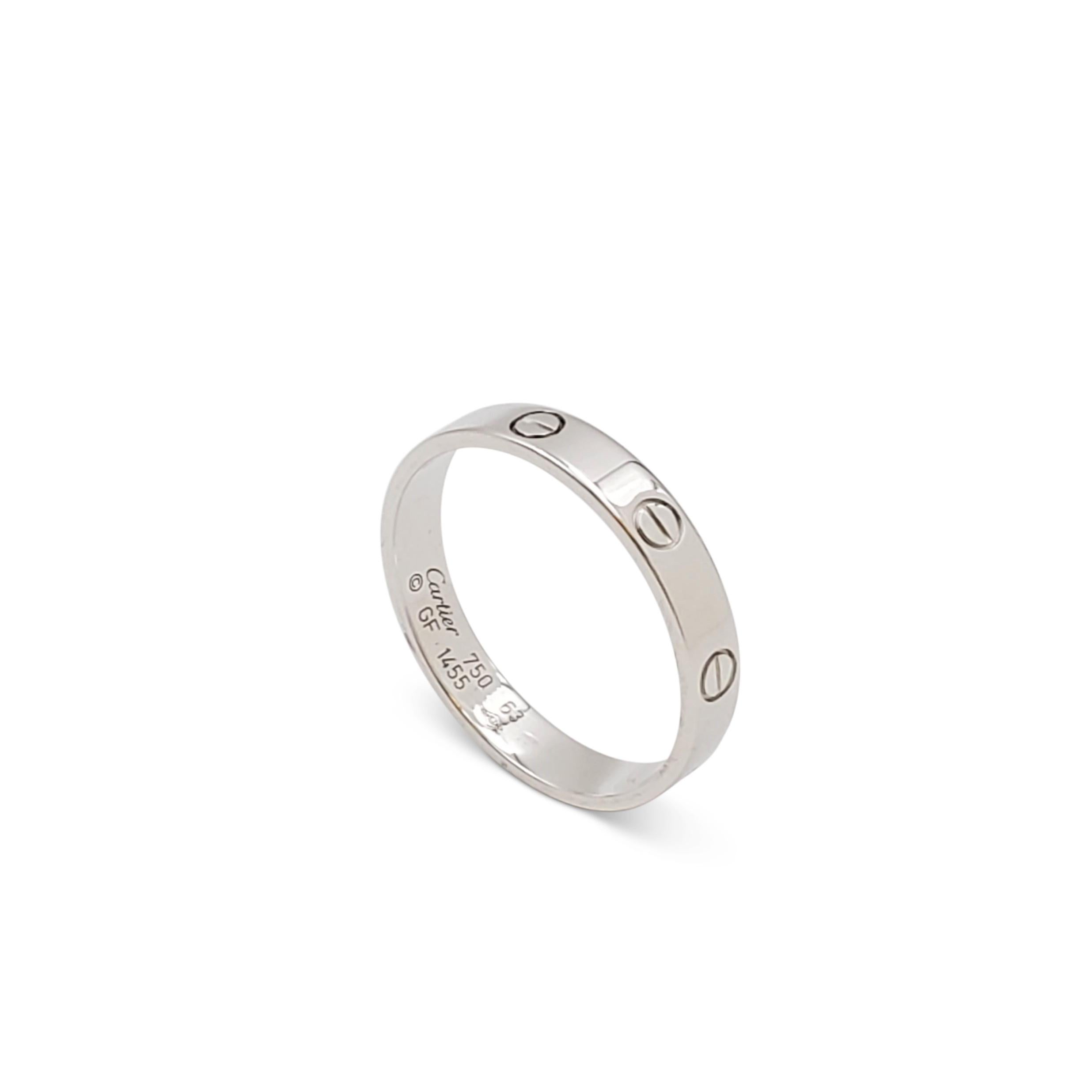 Authentic Cartier 'Love' wedding band crafted in 18 karat white gold. Signed Cartier, 750, with serial number. Ring size 63 (US 10 1/4). The ring is presented with the original box, no papers. CIRCA 2010s.

Brand: Cartier
Collection: Love
Metal: 18