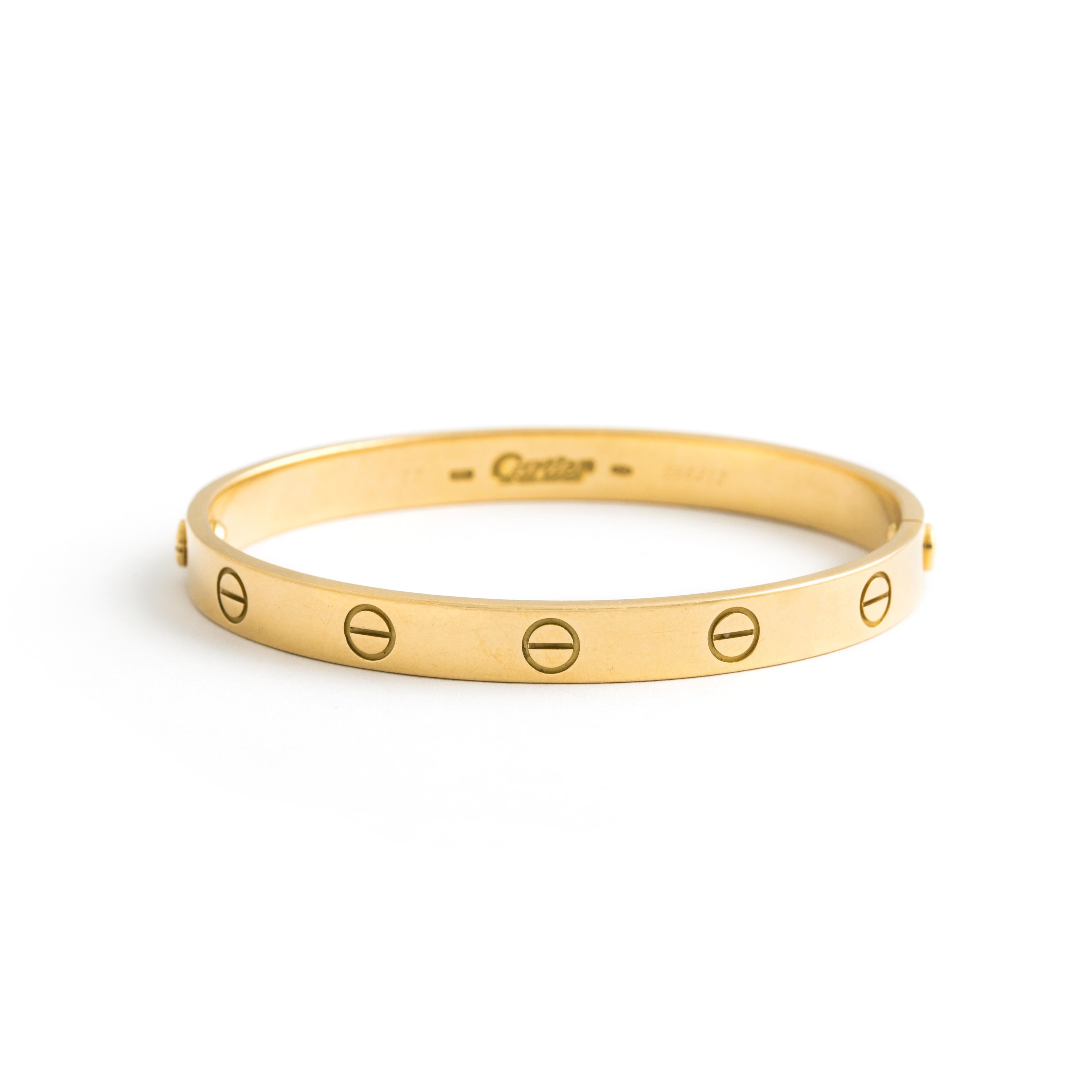 Cartier Love yellow gold 18K Bracelet. Size 17.
Signed Cartier and numbered.
Gross weight: 32.93 grams.