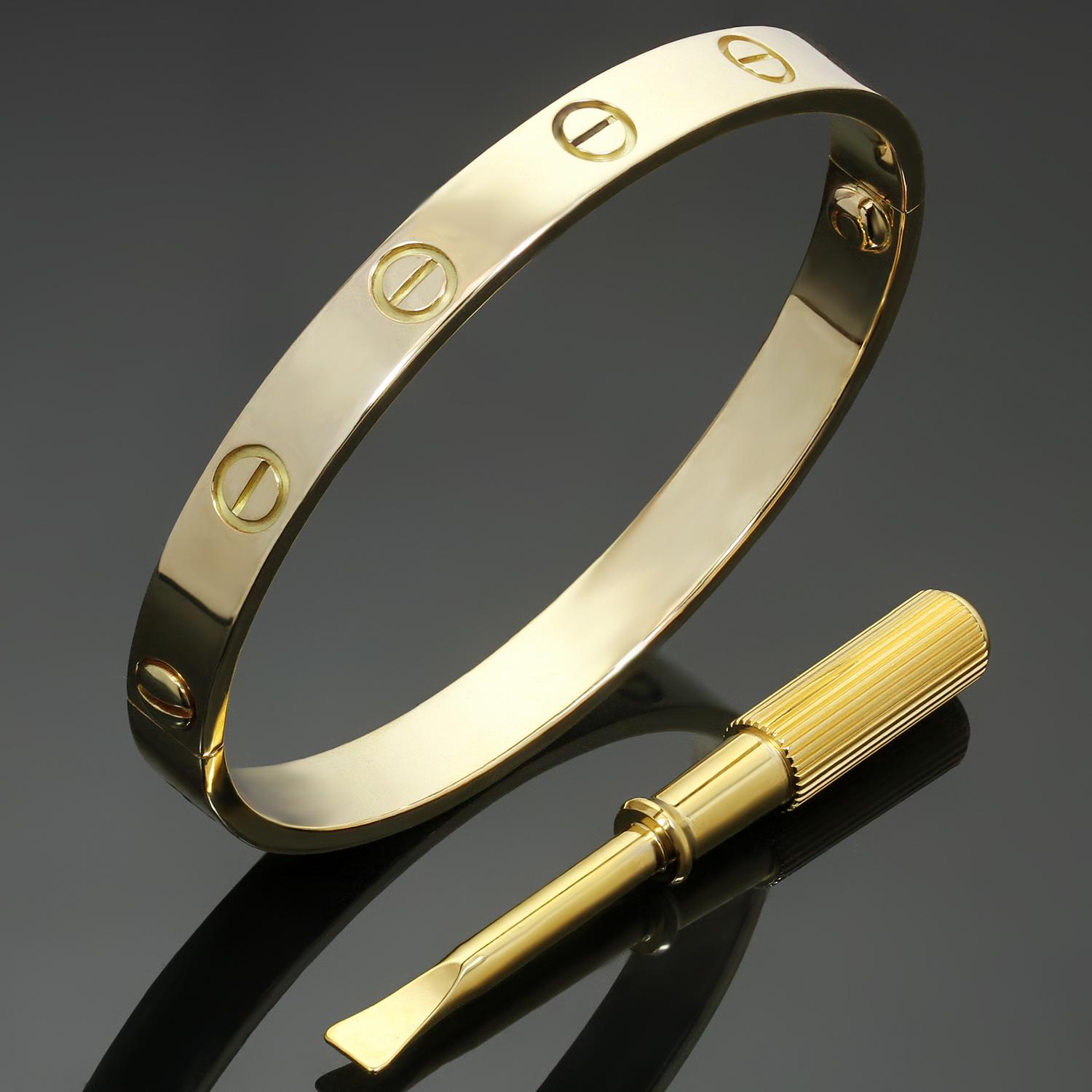 This classic Cartier bangle from the iconic Love collection is crafted in 18k yellow gold and completed with the Cartier pouch, screwdriver and Cartier service receipt. . This bracelet is a size 16. Made in France circa 2010s. Measurements: 0.23