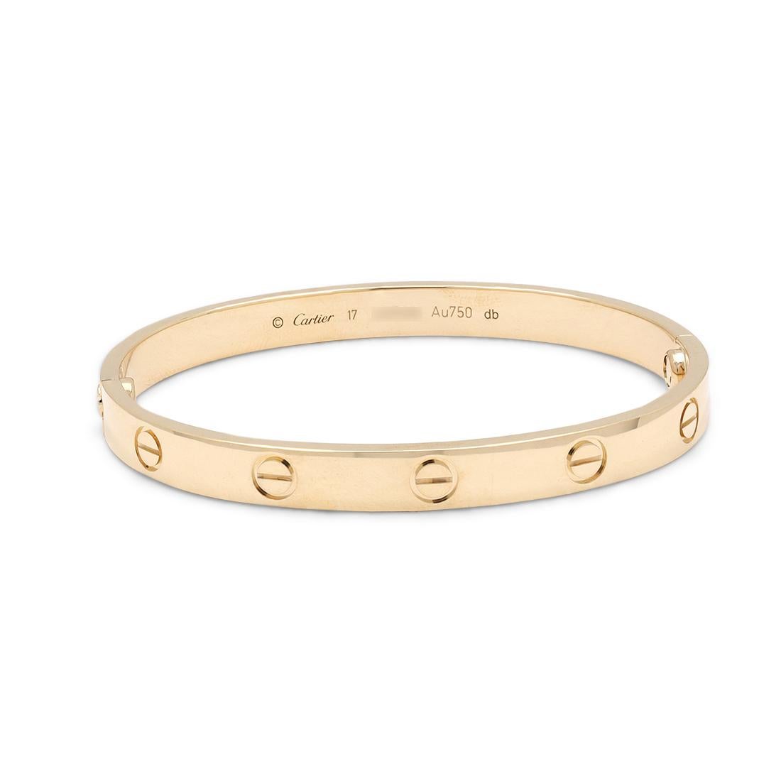 Authentic Cartier 'Love' bracelet crafted in 18 karat yellow gold. Size 17. Signed Cartier, 17, Au750, with serial number and hallmarks. The bracelet is presented with the original papers and box. CIRCA 2020s.

Brand: Cartier
Collection: Love
Metal: