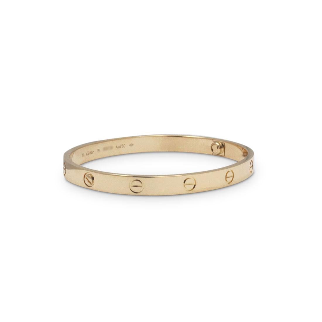 Authentic Cartier 'Love' bracelet crafted in 18 karat yellow gold. Size 19. Signed Cartier, 19, Au750, with serial number and hallmarks. The bracelet is presented with the original Cartier box and papers. CIRCA 2010s.

Brand: Cartier
Collection: