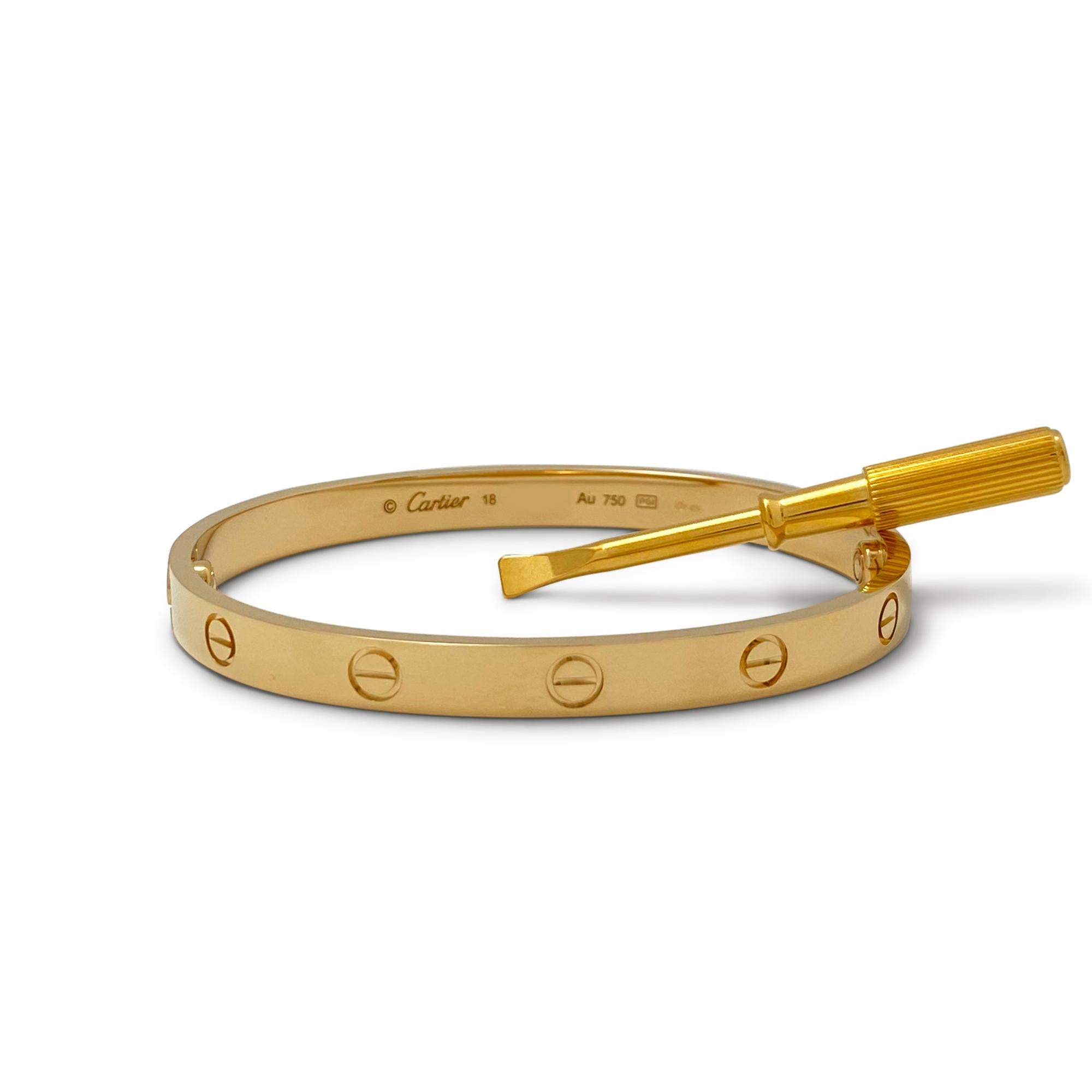 Authentic Cartier 'Love' bracelet crafted in 18 karat yellow gold. Size 18. Signed Cartier, 18, Au750, with serial number and hallmarks. The bracelet is presented with the original box, papers, and screwdriver. 
CIRCA 2010s

Brand: Cartier
Metal: