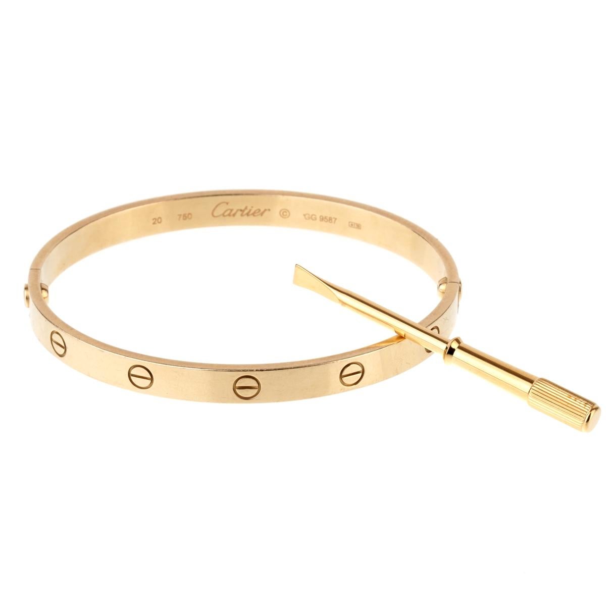 An iconic Cartier love bracelet in 18k yellow gold accompanied with the original screw driver. The bracelet is a size 20, and will fit a wrist upto 7.87
