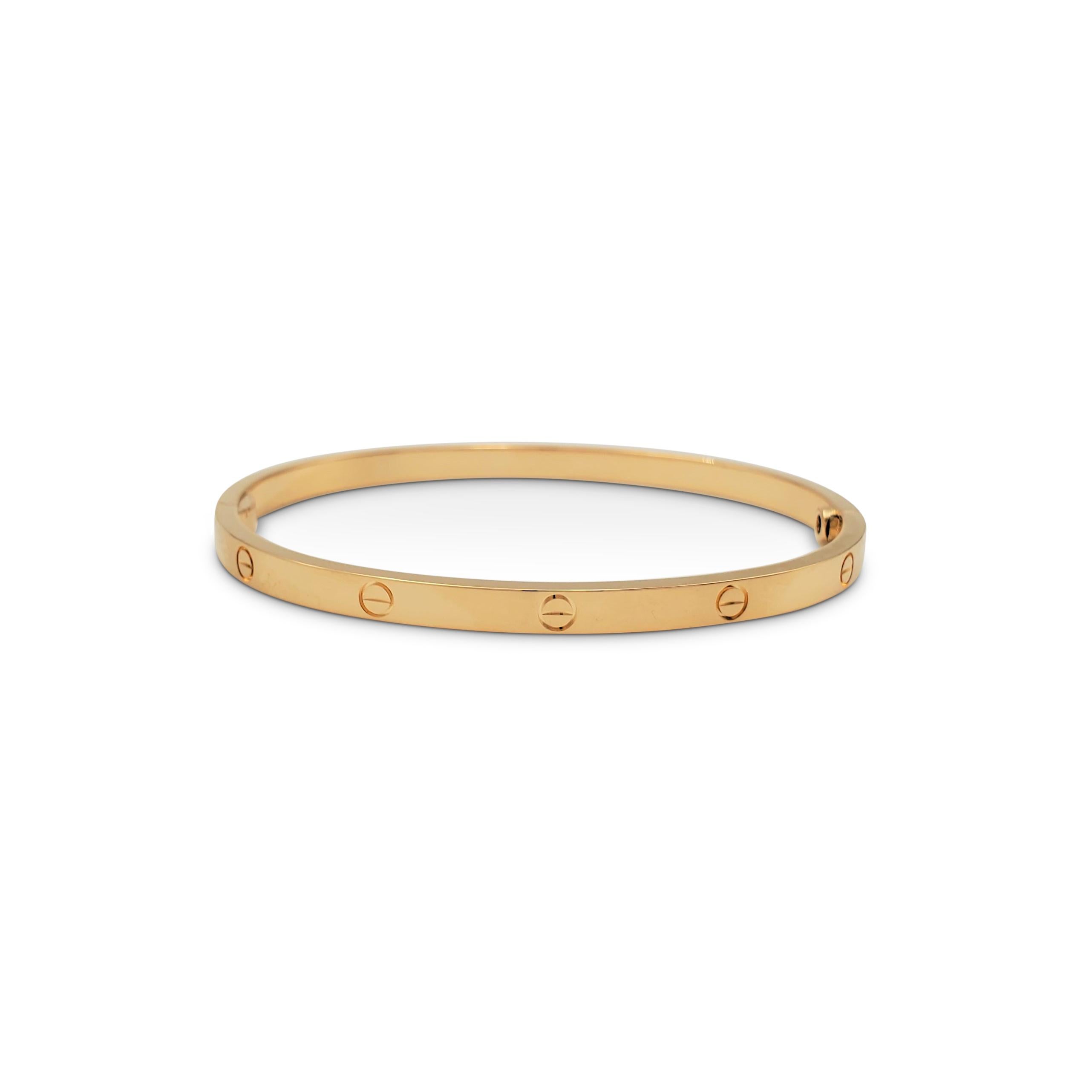 Authentic Cartier 'Love' bracelet crafted in 18 karat yellow gold. Size 16. Signed Cartier, 16, Au750, with serial number. The bracelet is presented with the original box, papers, and screwdriver. CIRCA 2010s.

Bracelet Size: 16 (16 cm)
Box: