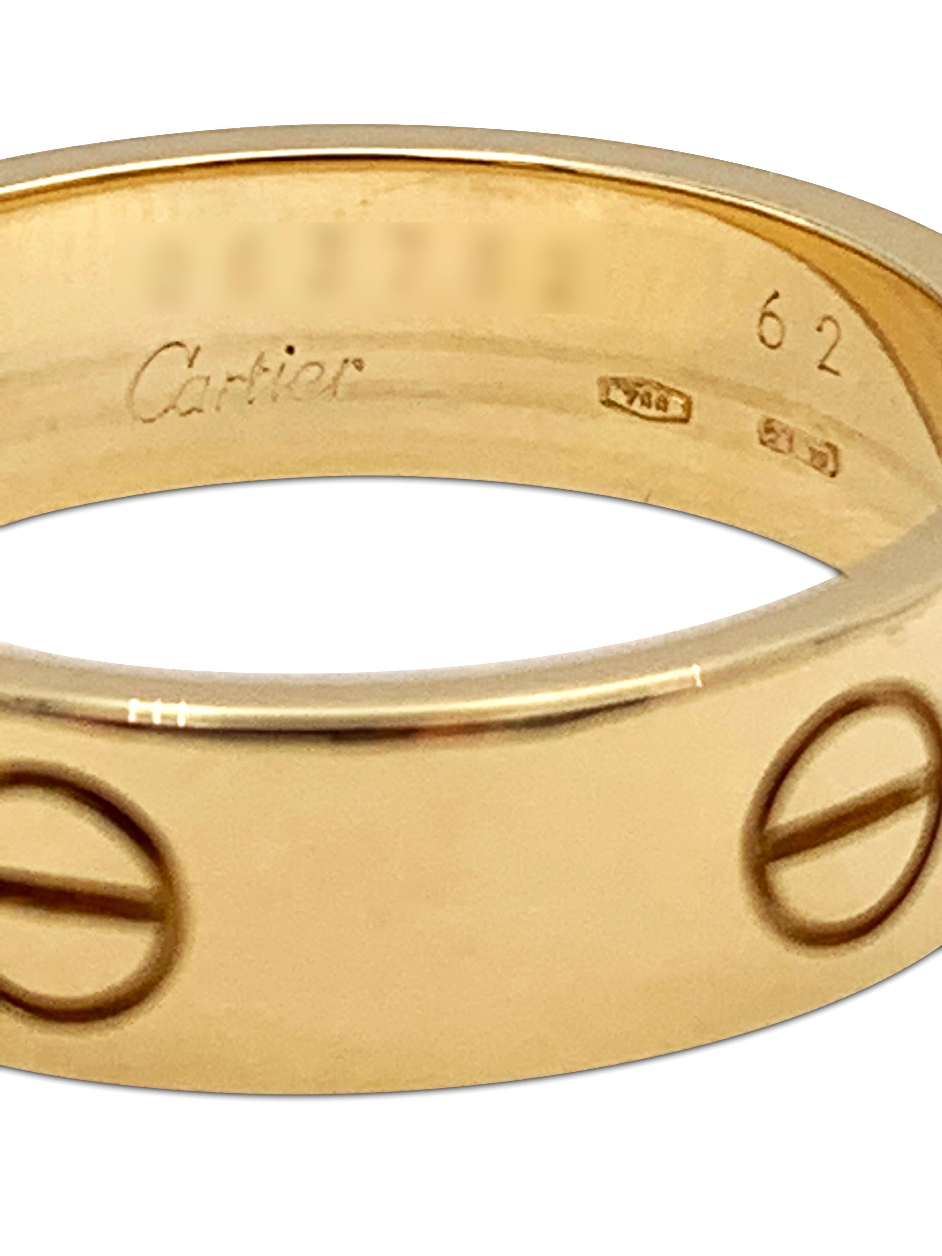 Authentic Cartier Love ring crafted in 18 karat yellow gold. Ring size 62 (US 10). Signed Cartier, 750, with serial number and hallmarks. The ring is not presented with original box or papers. CIRCA 2010s. 