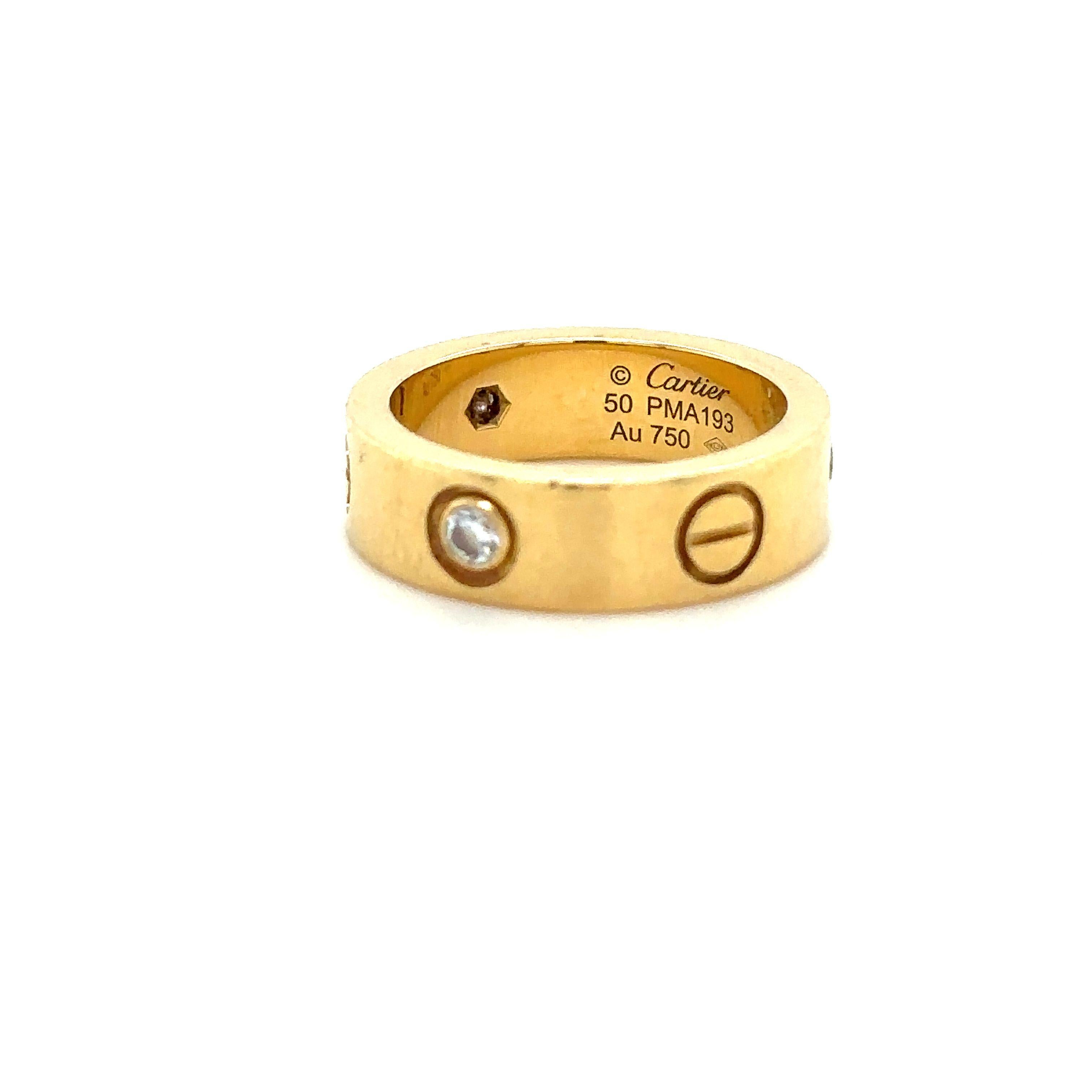 Unique features: 

Love ring, yellow gold 750/1000, set with 3 brilliant-cut diamonds. Width: 5.5mm.

Metal: Yellow Gold 750/1000
Carat: N/A
Colour: N/A
Clarity:  N/A
Cut: N/A
Weight: N/A
Engravings/Markings: Au750

Size/Measurement: 5.5mm width