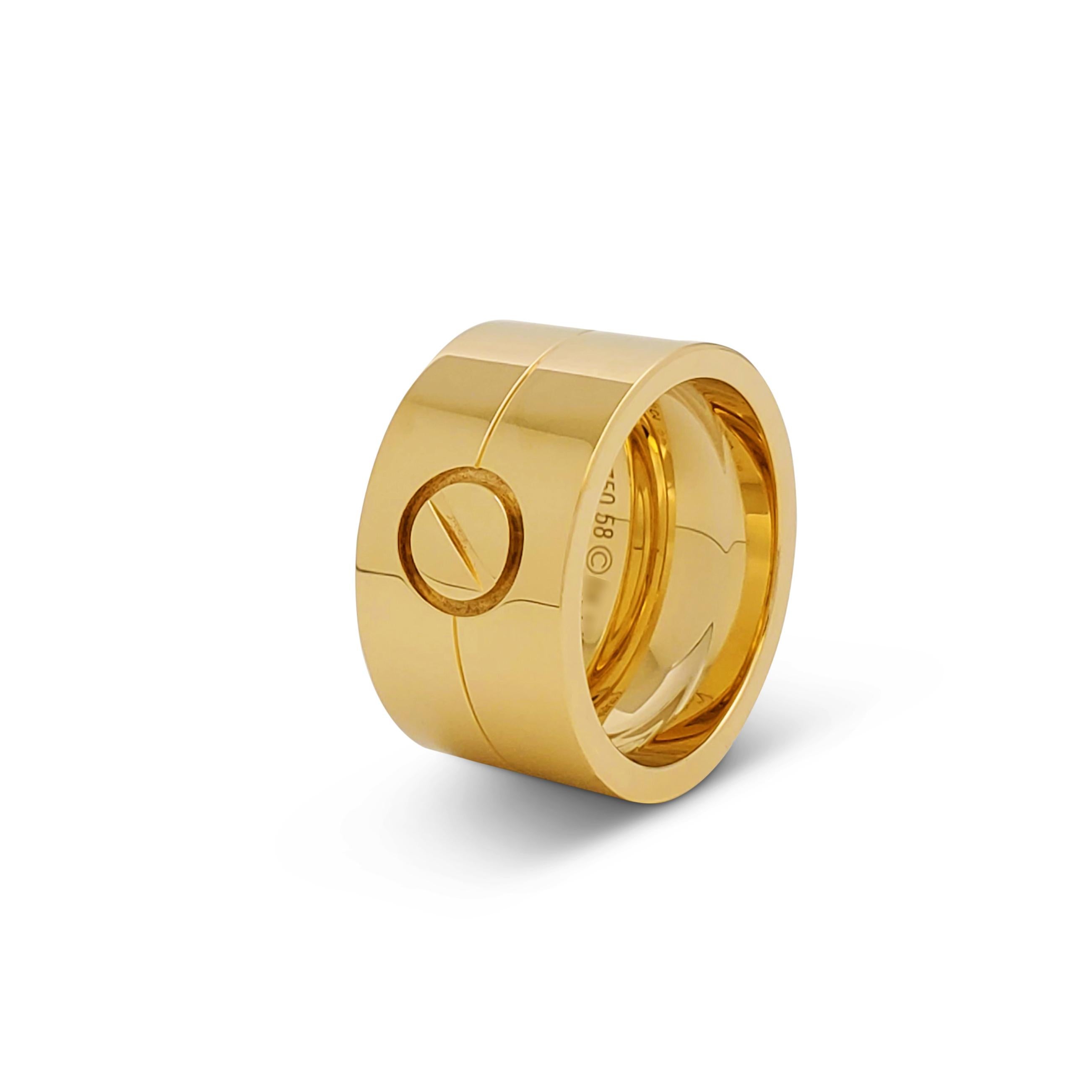 Authentic Cartier Love ring crafted in 18 karat yellow gold and featuring the brand's iconic screwtop design, represented here as a single motif.  Size 58, US 8 1/2.  Signed Cartier 750, 58, with serial number.  Ring is accompanied by Cartier pouch
