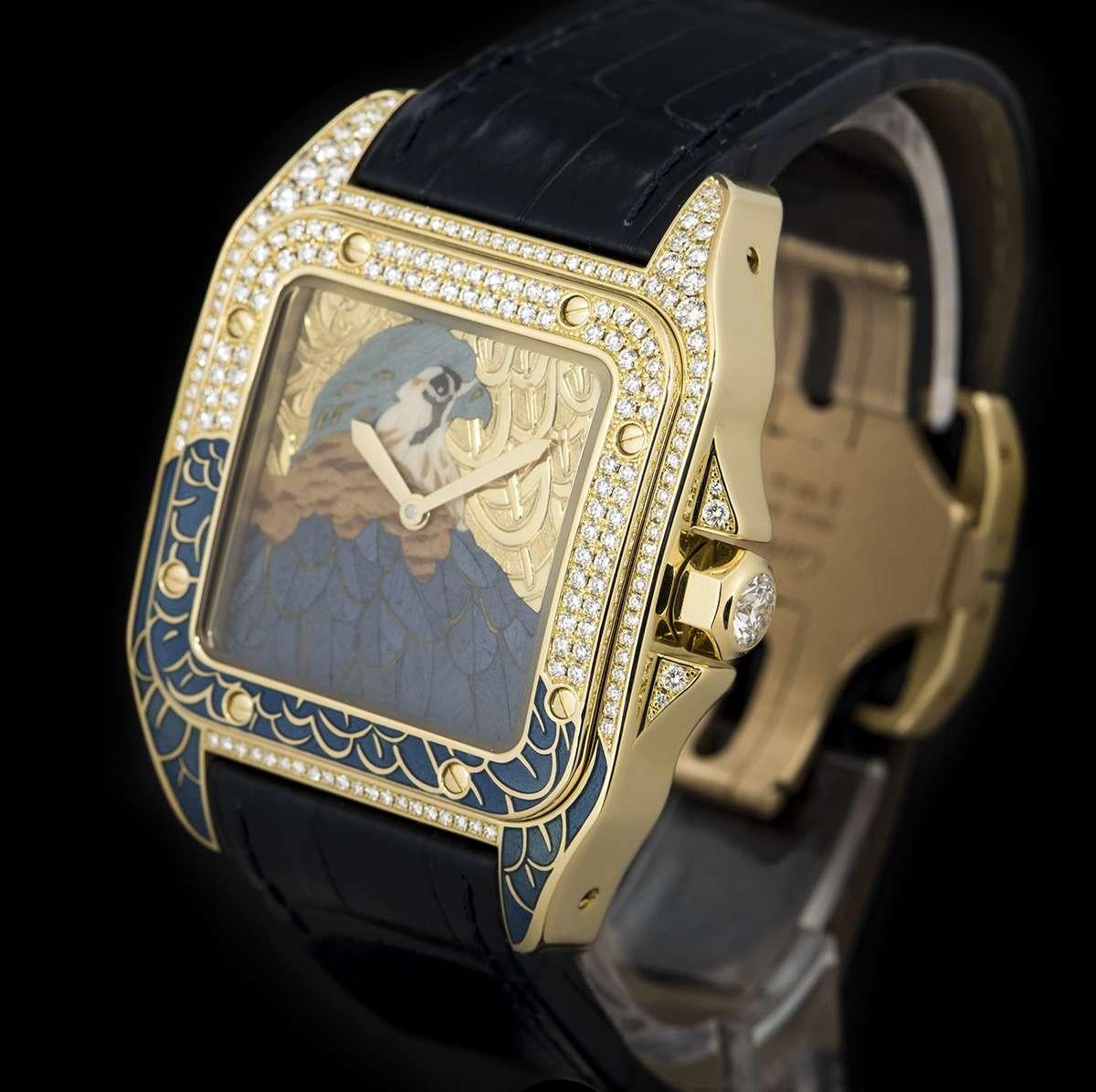An 18k Yellow Gold Limited Edition Falcon D'Art Santos 100 Gents Wristwatch, enamel dial emblazoned with falcon motif, a fixed 18k yellow gold bezel set with approximately 72 round brilliant cut diamonds, 18k yellow gold case and 18k yellow gold