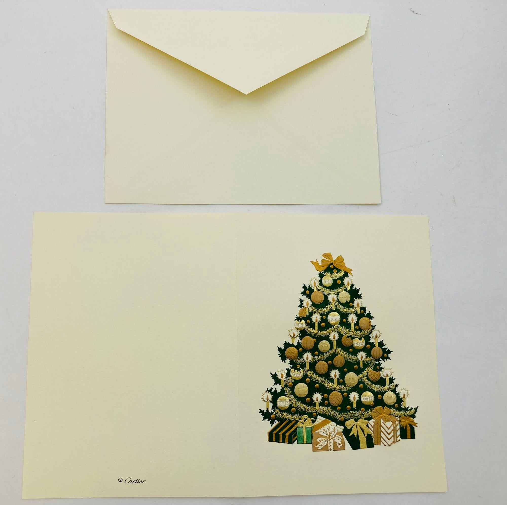 Set of 10 Cartier Cards and Envelopes with the Iconic Cartier Christmas Tree Design.
Cartier Season's Greetings Christmas Tree Stationary Cards.
Authentic Luxury Cartier Stationery Cards and Envelopes with Christmas Tree Design, limited edition Desk
