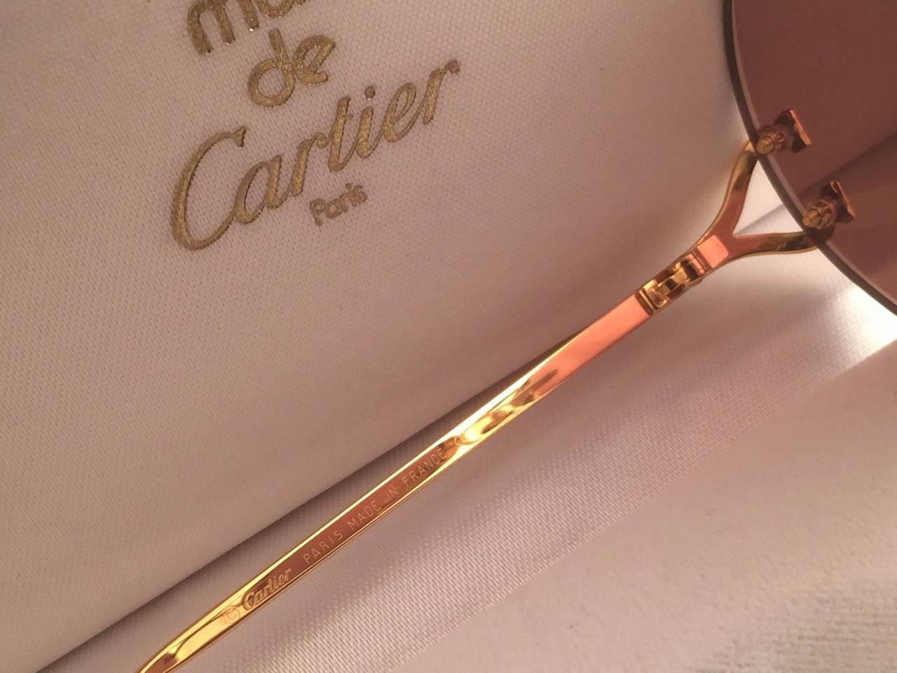 Cartier Madison Round Rimless Gold Brown Lens France Sunglasses In New Condition For Sale In Baleares, Baleares