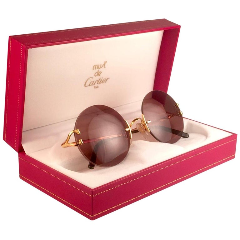 Cartier Madison Round Rimless Gold Brown France Sunglasses For Sale at 1stDibs | cartier circle glasses, cartier round cartier round rimless glasses