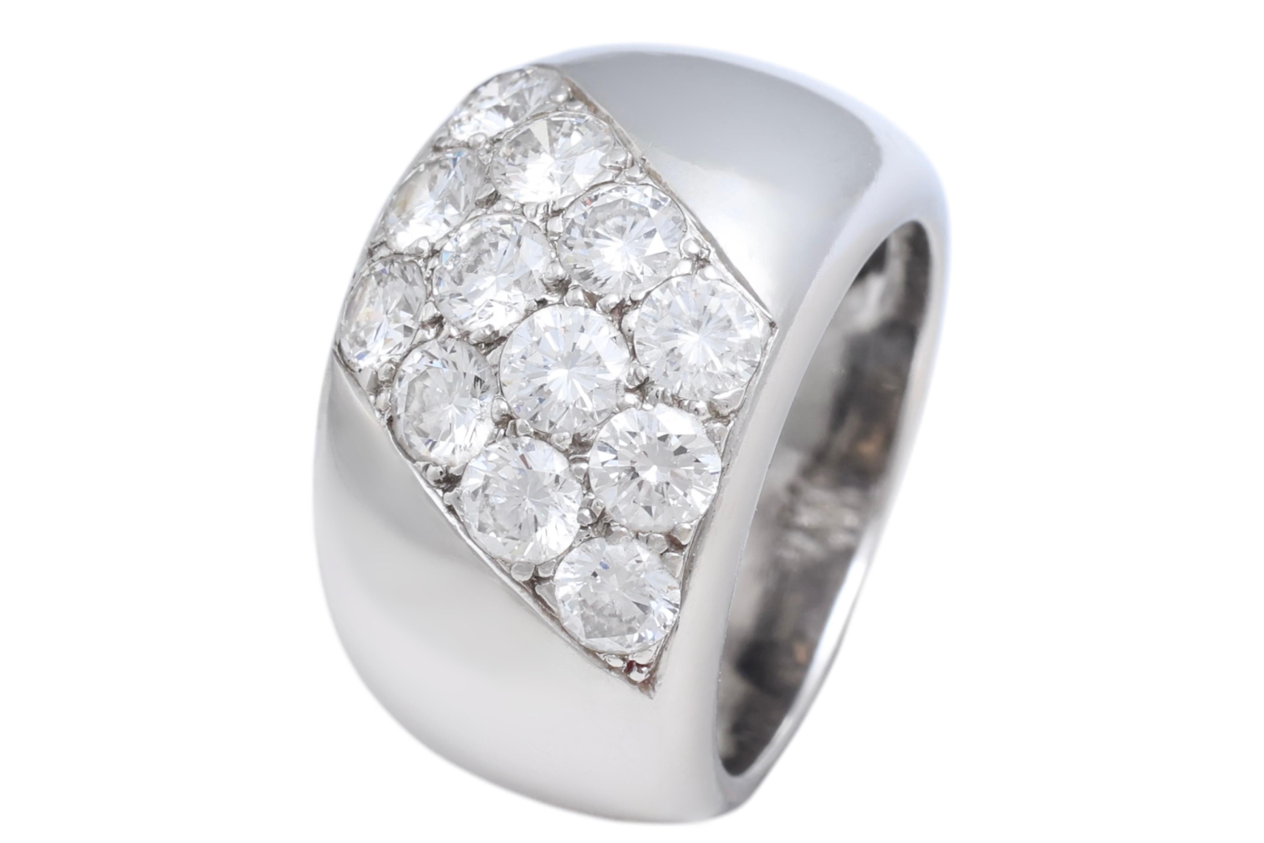 18 Kt White Gold Cartier Diamond Dome Ring

Size : 54 EU  /  7 1/4 US

Was completely Re polished like new by Cartier .