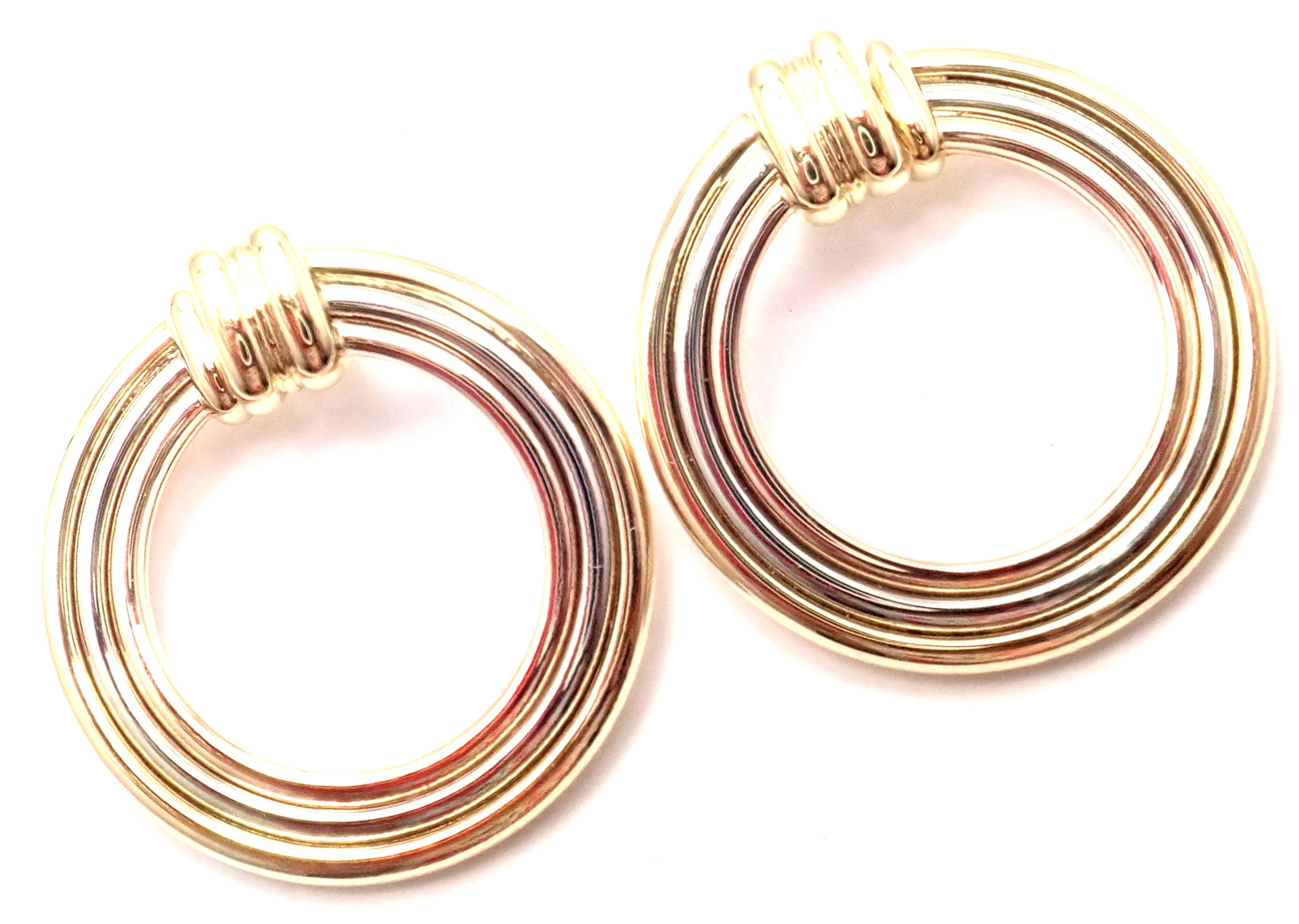 18k Tri-Colored Gold (Yellow, White, Rose) Cartier Magnolia Earrings by Cartier. 
These earrings are for pierced ears. 
Details: 
Weight: 15.3 grams
Measurements: 31mm 
Stamped Hallmarks: Cartier 750 779016
*Free Shipping within the United States*