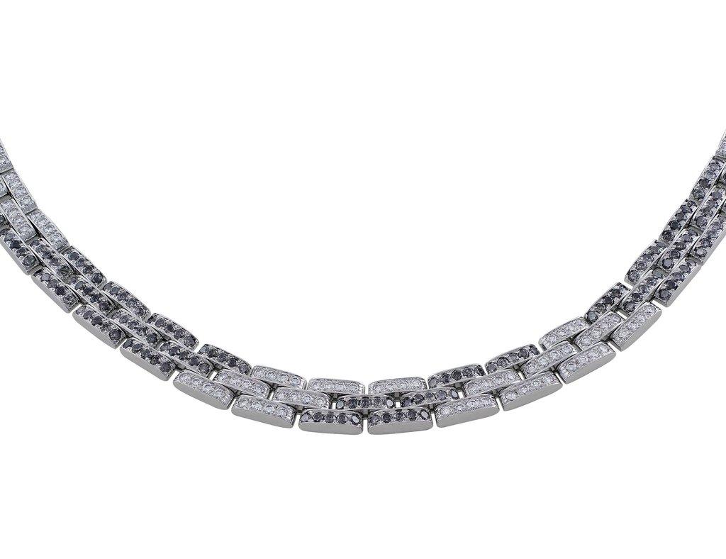 Absolutely Gorgeous Cartier Maillon Panther Black and White Diamond Necklace. This stunning 18k white gold Cartier Maillon Panther necklace is set with black and white diamonds weighing a total of approximately 15.46cttw. There are 224 white