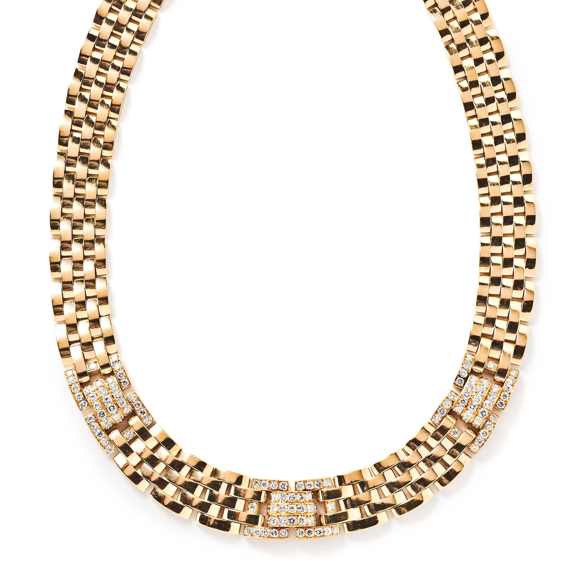 Named after Cartier’s iconic panther and noted for its comfort and ease of drape, this Maillon Panthère necklace features five rows of 18k yellow gold interlocking brickwork links highlighted by three diamond segments. It sits high on the neck and