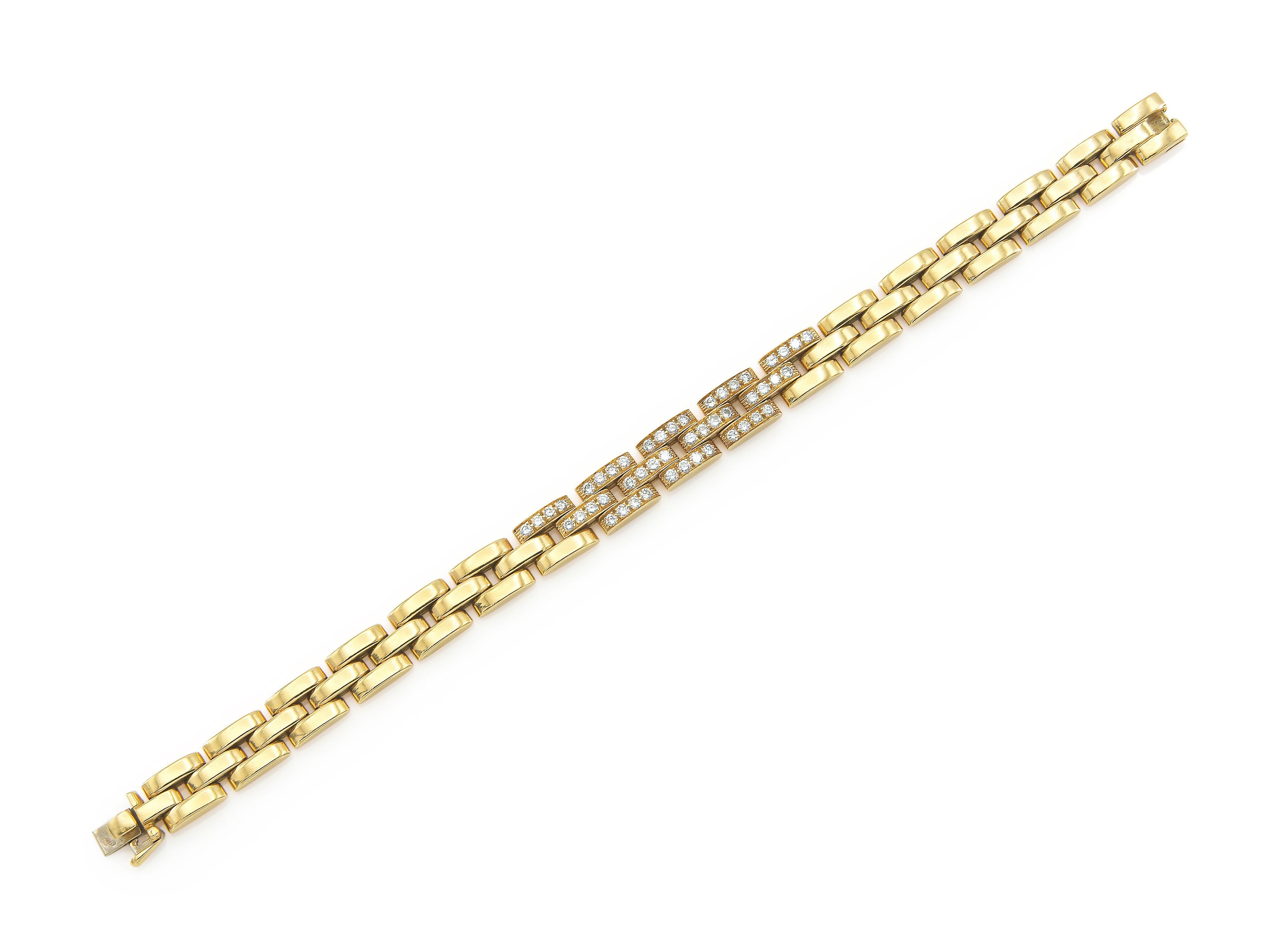 Finely crafted in 18k yellow gold with Round Brilliant cut Diamonds.
Signed by Cartier
Size 7 1/4 inches