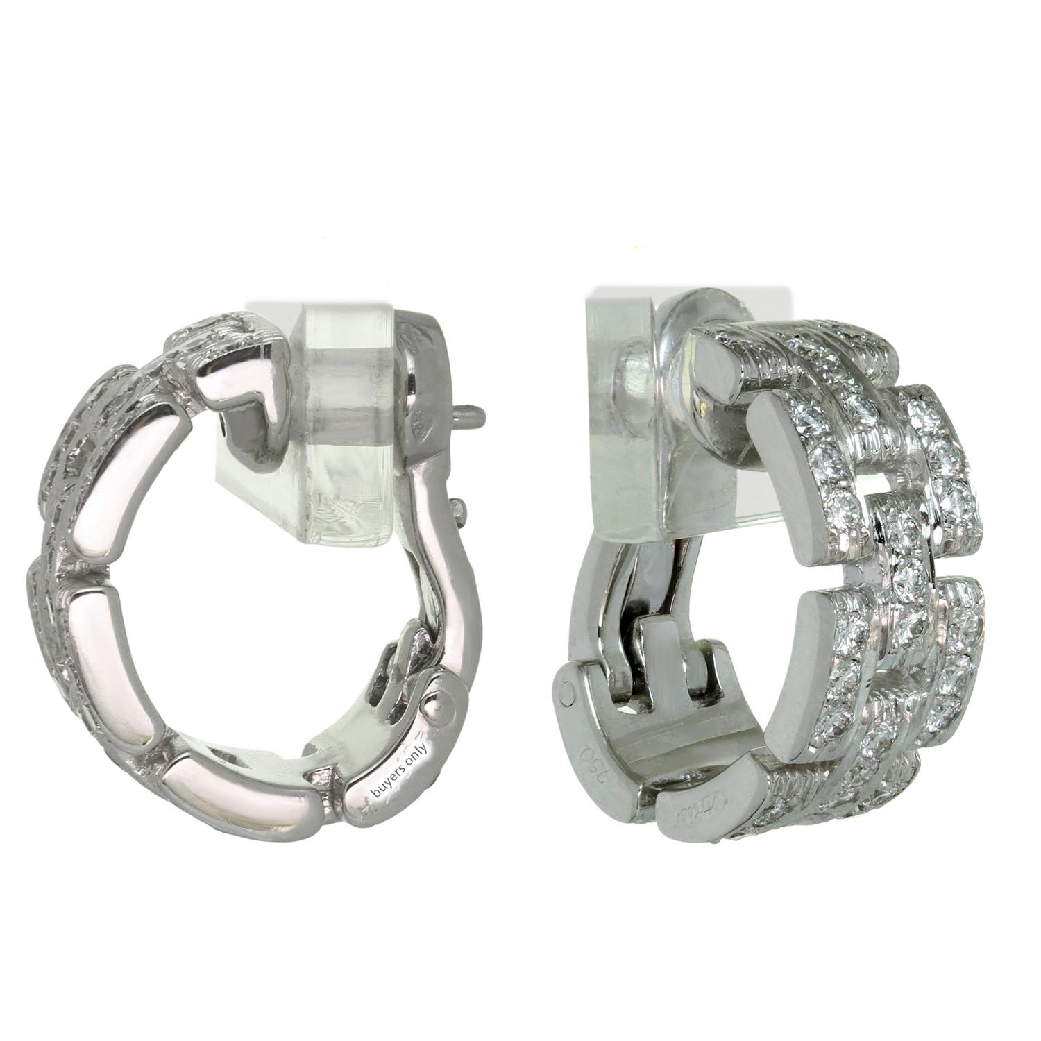 These gorgeous Cartier wrap earrings from the iconic Maillon Panthere collection are crafted in 18k white gold and feature conic solid links pave-set with 72 round brilliant cut diamonds weighing an estimated of 1.30 carats. Made in France circa