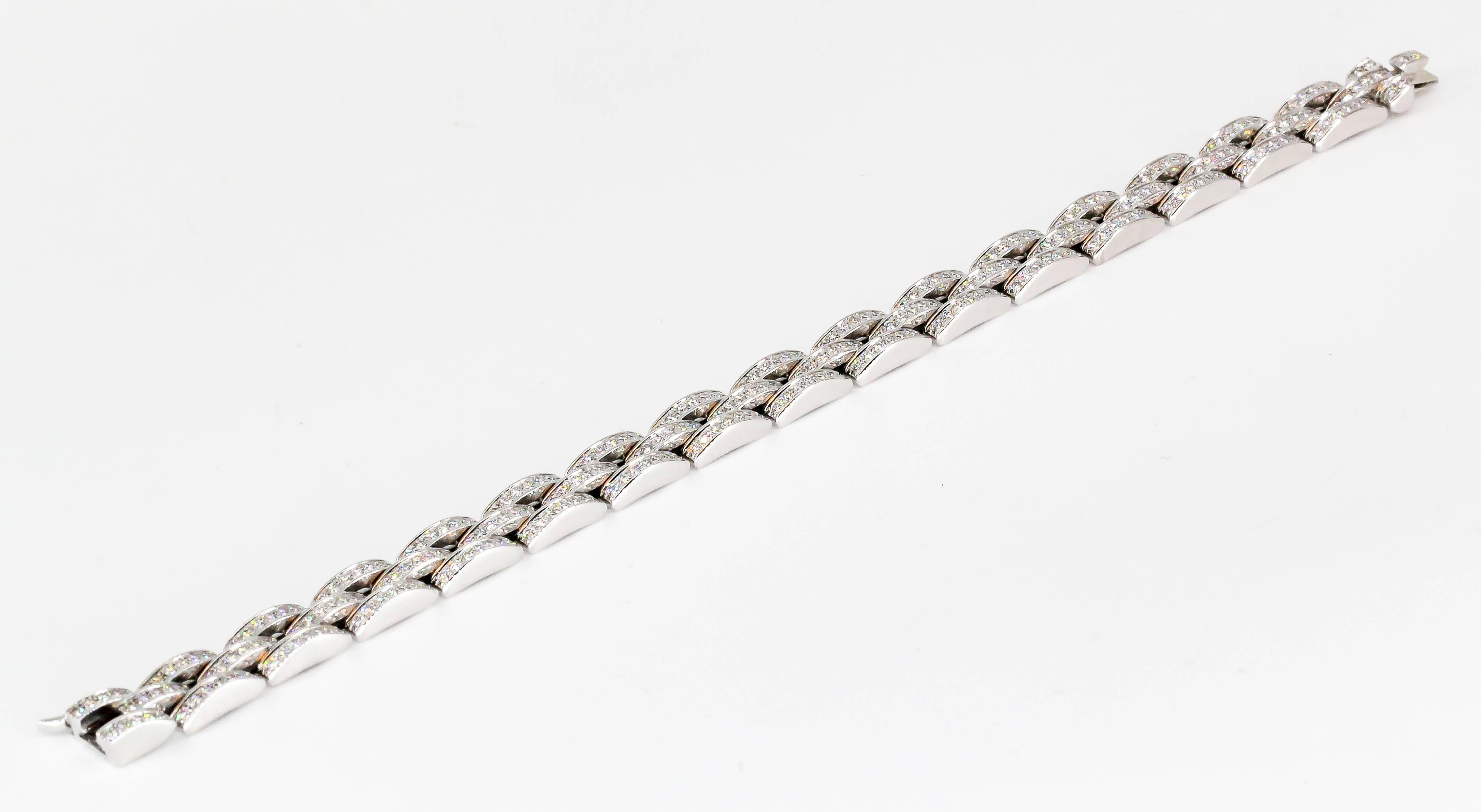 Beautiful contemporary diamond and 18K white gold 3 row link bracelet from the 