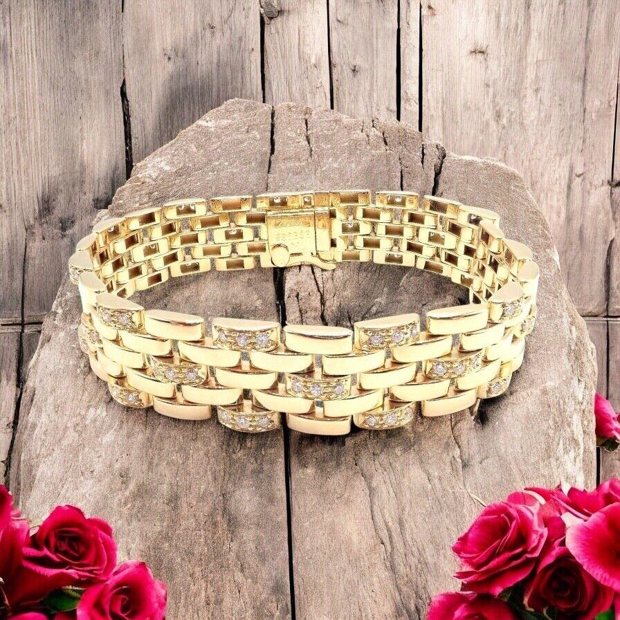 18k Yellow Gold 5 Row Maillon Panthere Diamond Link Bracelet by Cartier. 
Cartier’s iconic Maillon Panthère 18K Gold Diamond Five Row Link Bracelet radiates allure. 
Expertly crafted from gleaming 18k gold, it features five rows of signature
