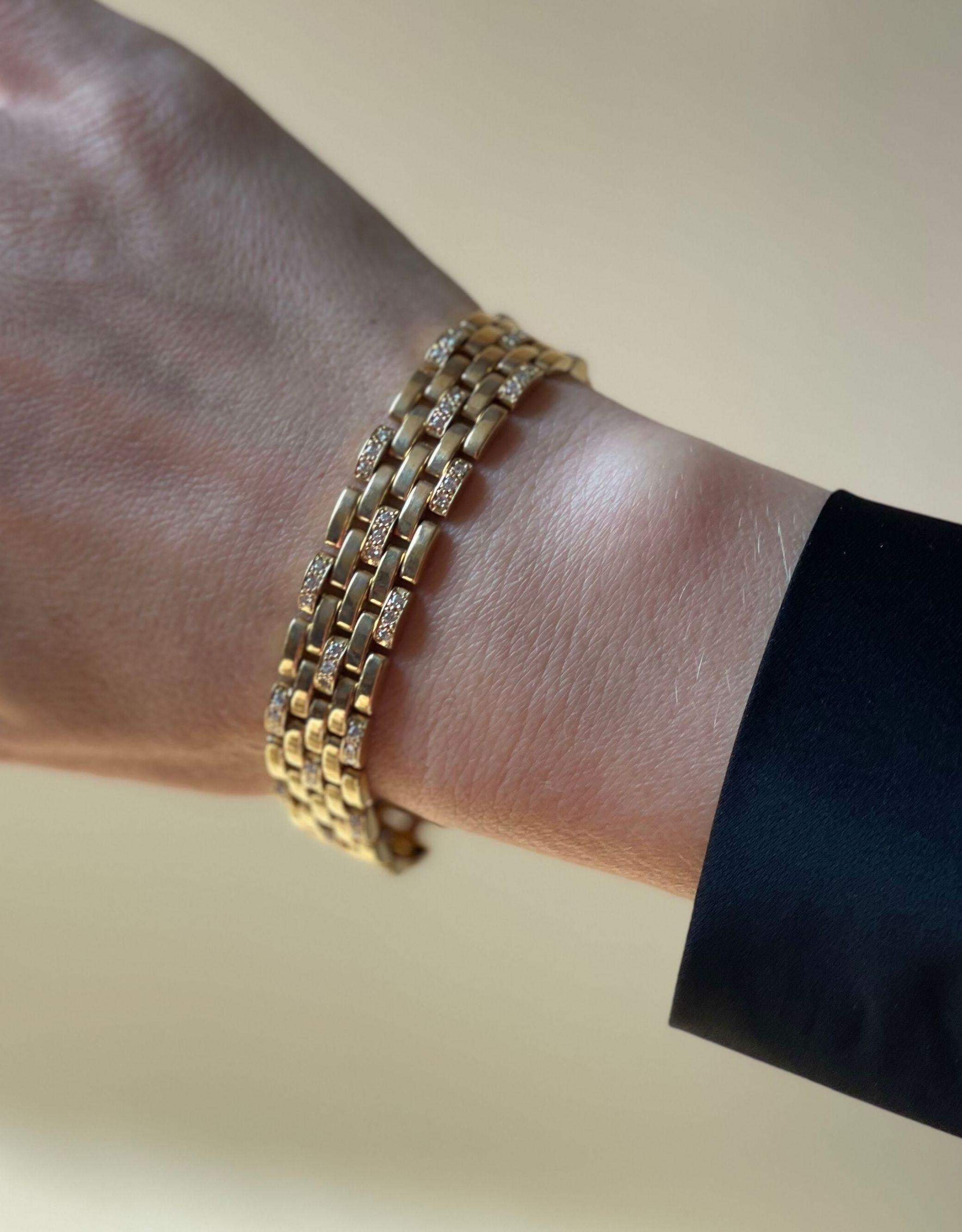Classic Maillon Panthere 18k gold link bracelet by Cartier, adorned with approx. 1.06ctw G/Vs diamonds. Bracelet is 7 1/8