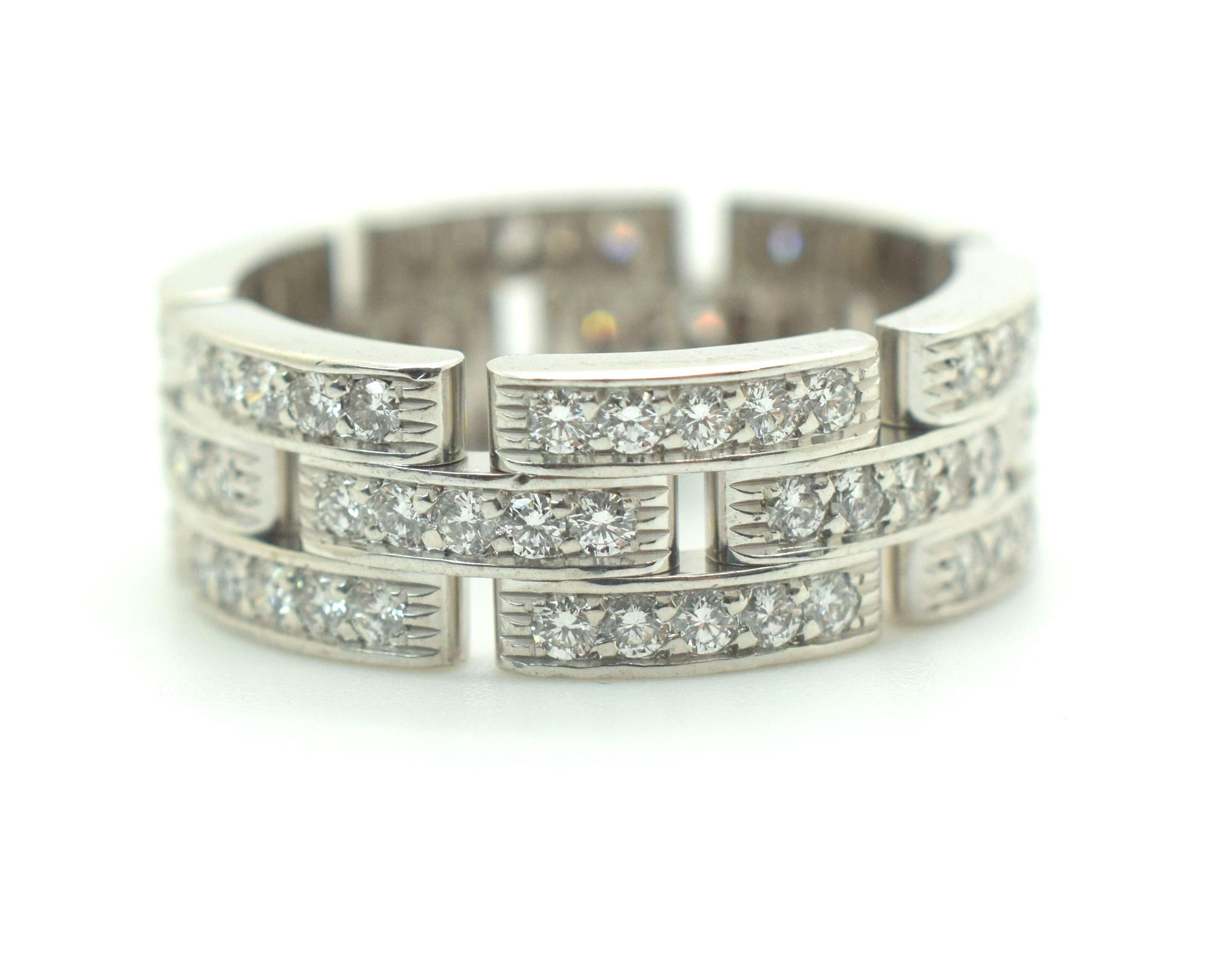 Cartier Maillon Panthère Wide Band Ring. Three rows of interlocking pave set diamond links in 18K White Gold. Carat Total Weight: 1.44 Color: E-F Clarity: VVS1 Signed Cartier and Numbered. Cartier size 60 U.S. Size 9. Not sizable.
Comes with