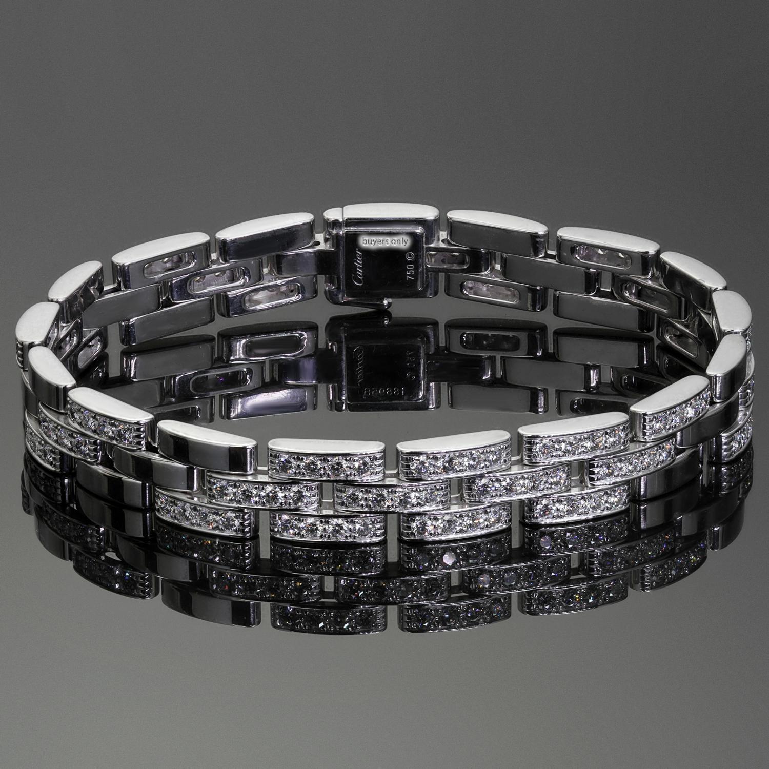 This classic Cartier bracelet from the iconic Maillon Panthere collection features 3 rows of rectangular links crafted in 18k white gold and set with 120 brilliant-cut round D-E-F VVS1-VVS2 diamonds weighing an estimated 5.00 carats. Made in France