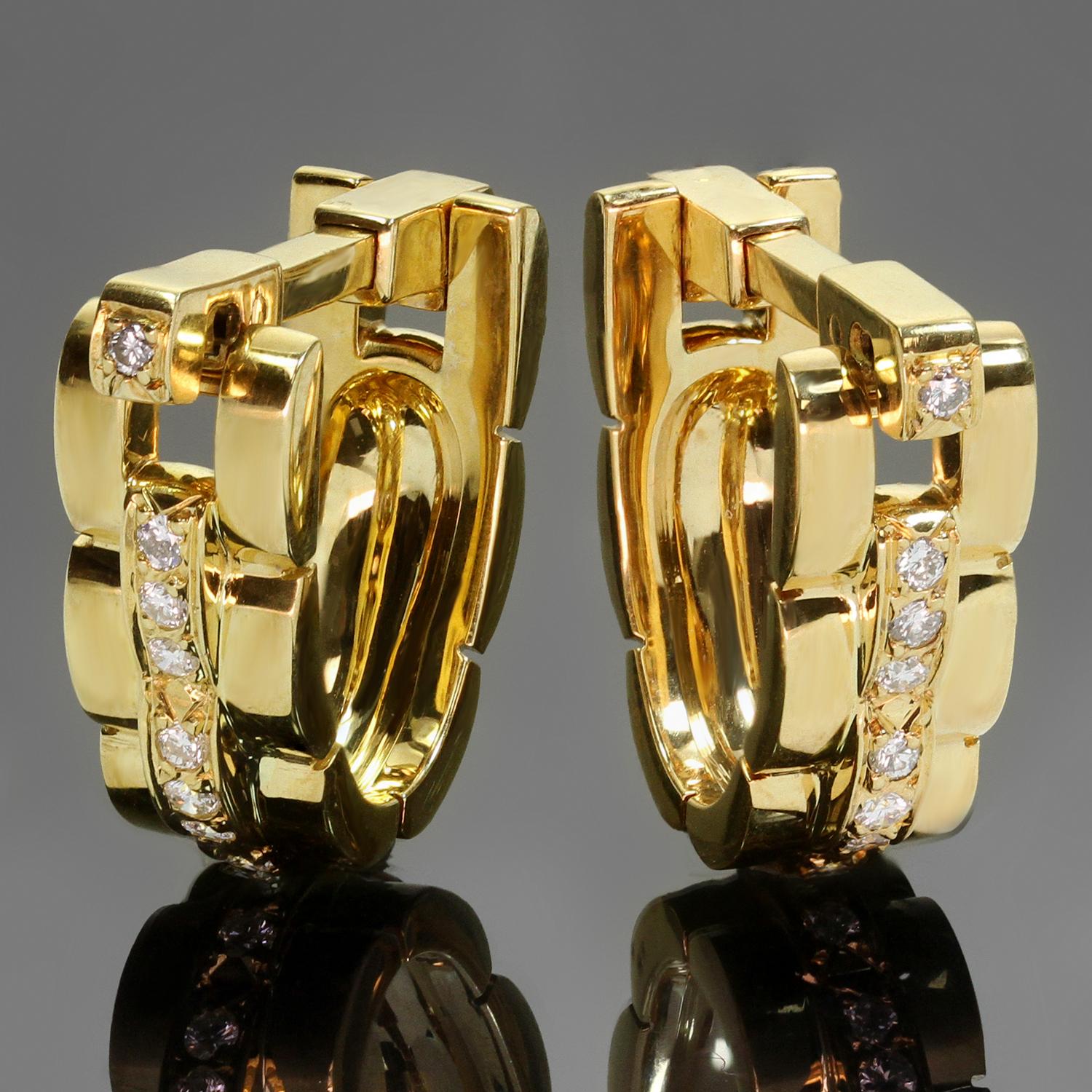 Diese ikonischen Steigbügel-Manschettenknöpfe aus der klassischen Kollektion Maillon Panthere von Cartier sind aus 18 Karat Gelbgold gefertigt und mit E-F VVS2-VS1-Diamanten mit einem geschätzten Gewicht von 0,60 Karat besetzt. Hergestellt in