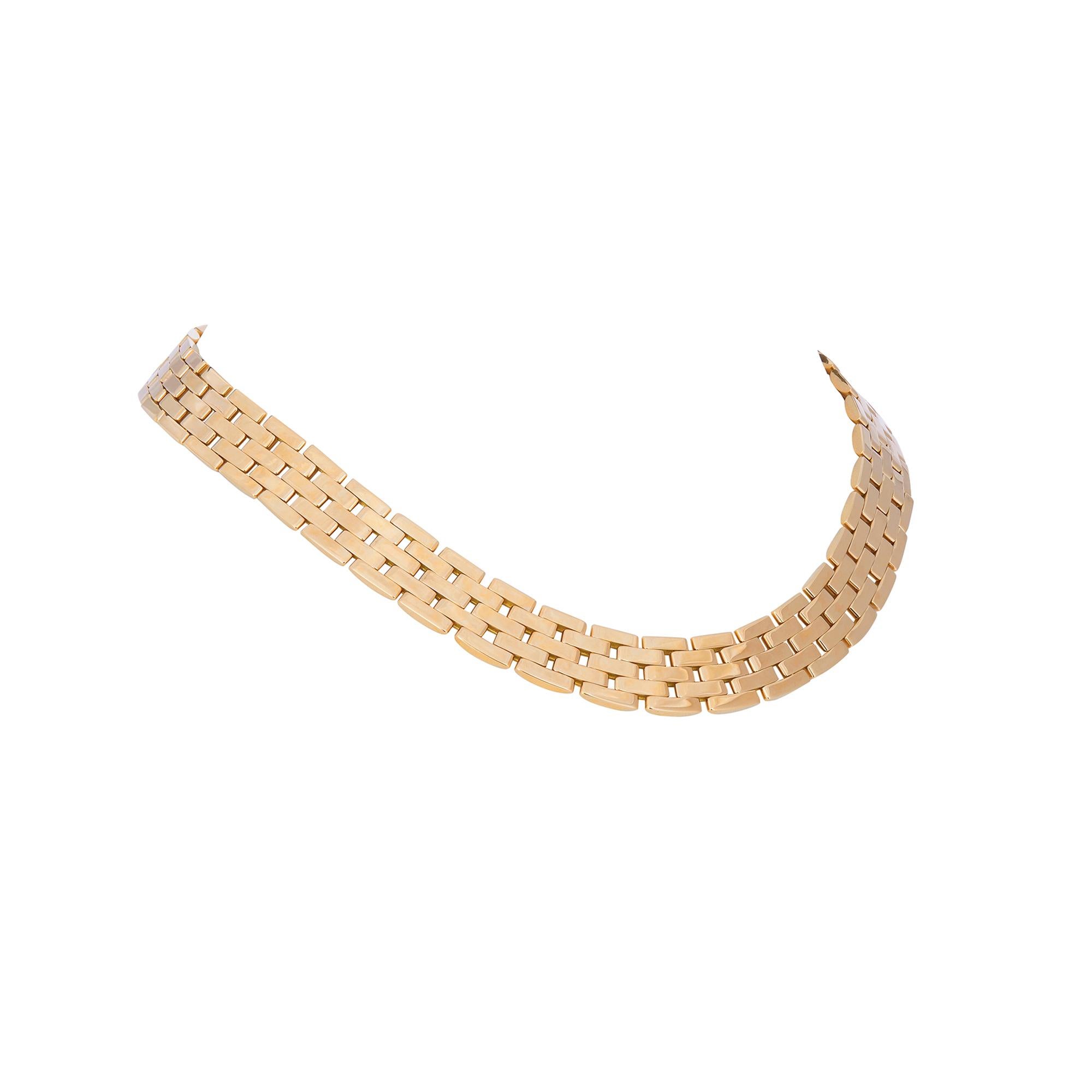 Authentic Cartier Maillon Panthère necklace crafted in 18 karat yellow gold.  Featuring five rows of high polished gold links in the icon Panthère de Cartier pattern, the necklace measures 16 inches in length and 1/2 inch wide.  Signed Cartier, 750,