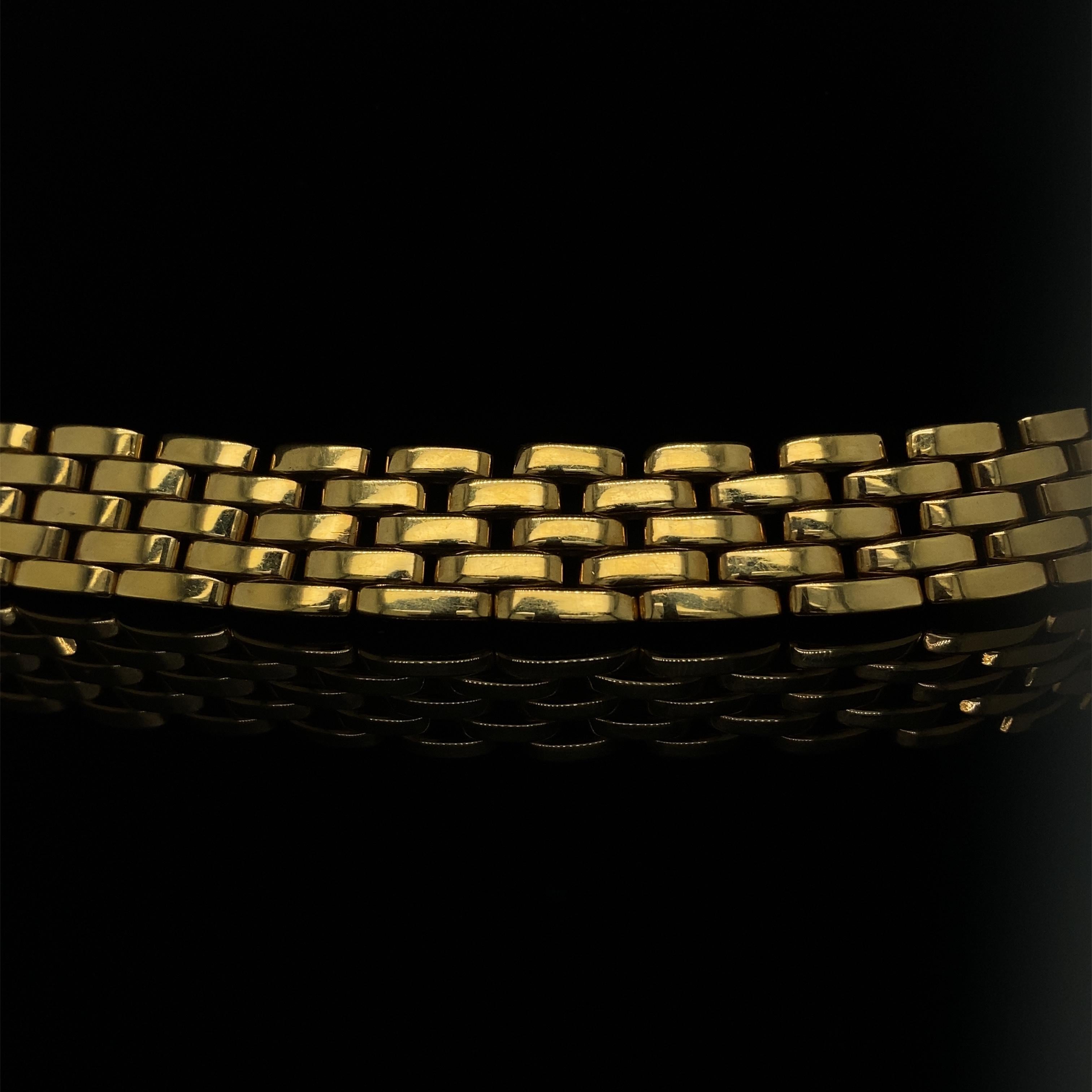 Cartier Maillon Panthere five-row yellow gold necklace.

The necklace comprises of Cartier's classic flat solid brick style links in 18 karat yellow gold.

The Maillon Panthère brick link design is an iconic piece due to its recognizable design and