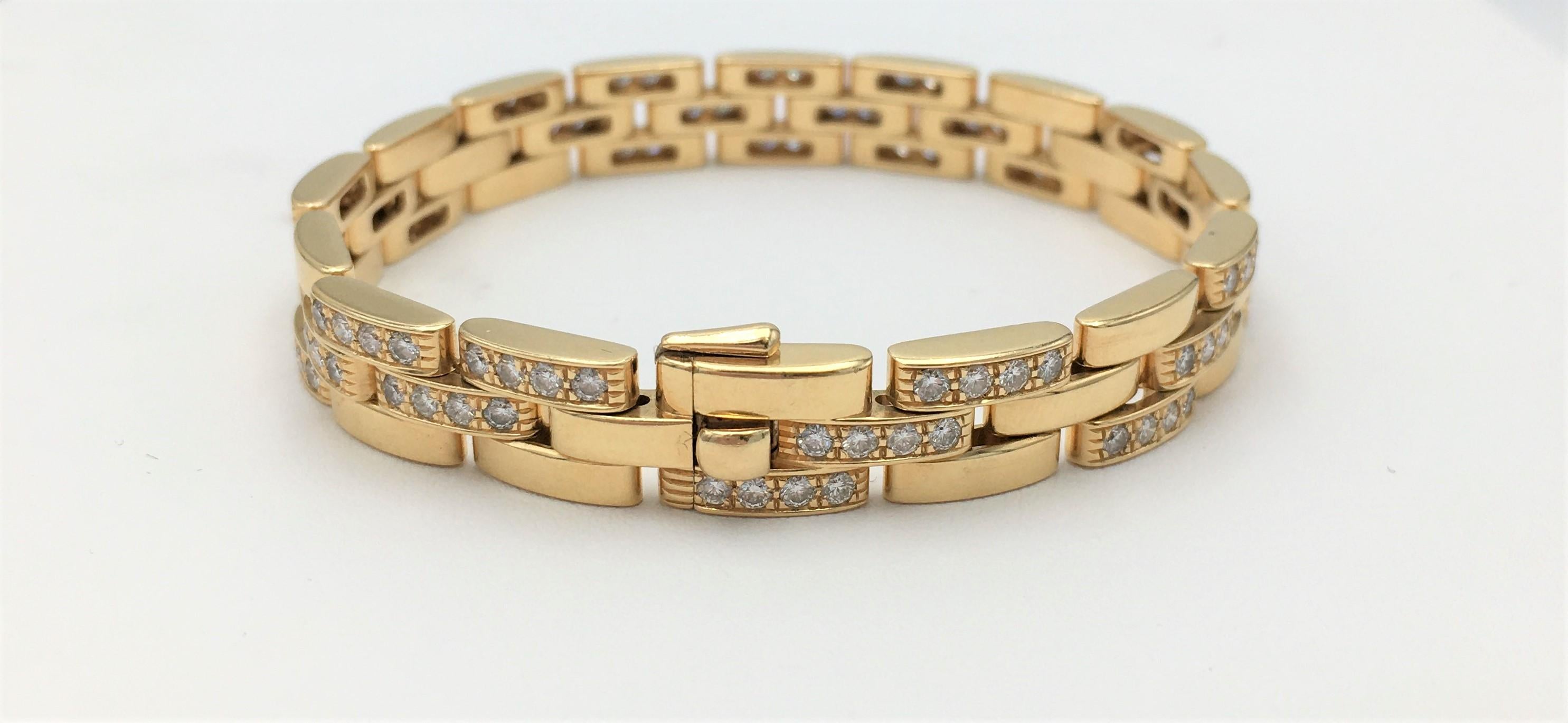 Authentic Cartier 'Maillon Panthère' three-row bracelet crafted in 18 karat yellow gold and set with an estimated 3.50 carats of high quality round brilliant cut diamonds. Signed Cartier, 750, with hallmarks. Cartier signature is rubbed, but visible
