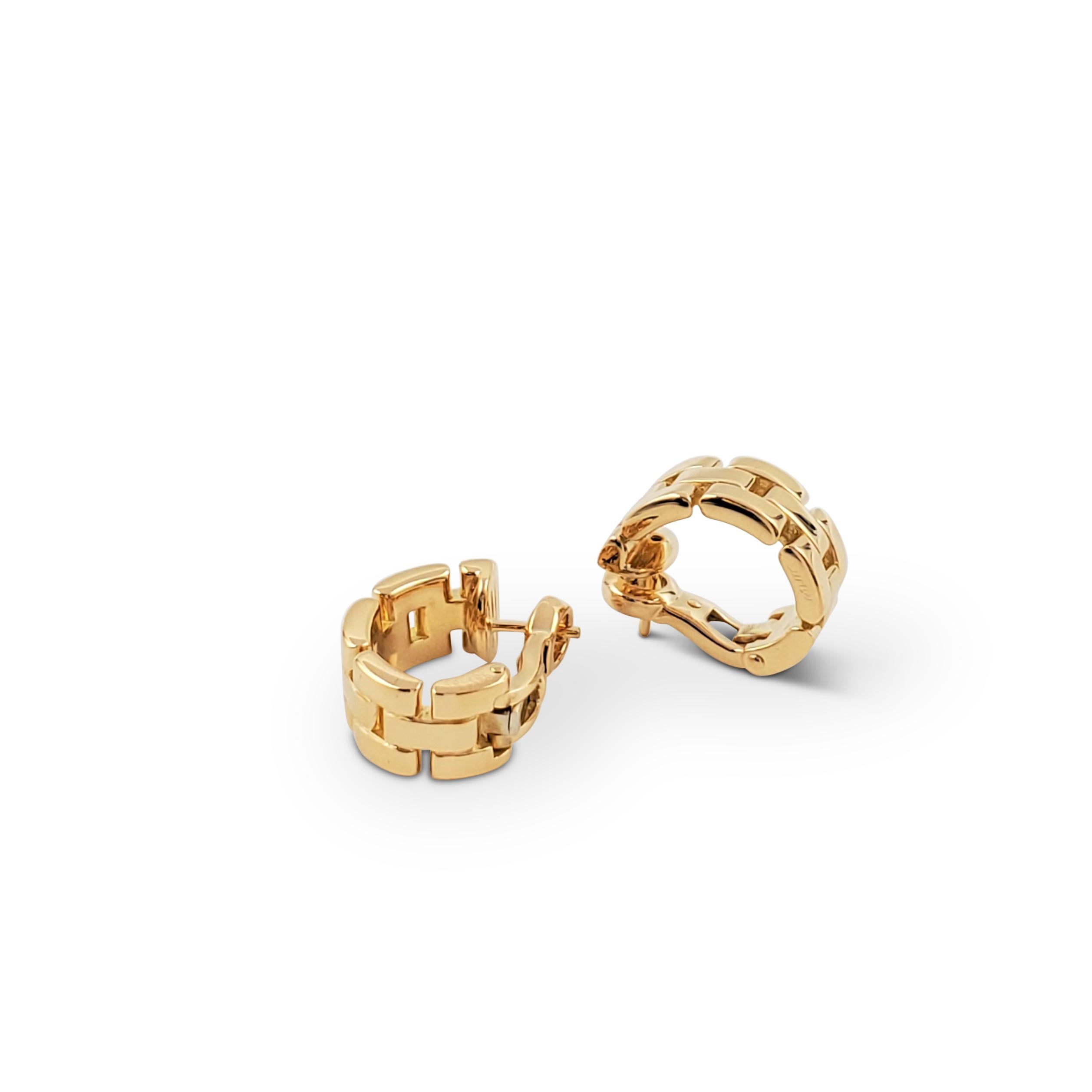 Authentic Cartier Maillon Panthere earrings crafted in 18 karat yellow are composed of five rows of iconic flat links in a half hoop design. Signed Cartier, 750, with serial number and hallmark. Presented with the original Cartier pouch, no box or