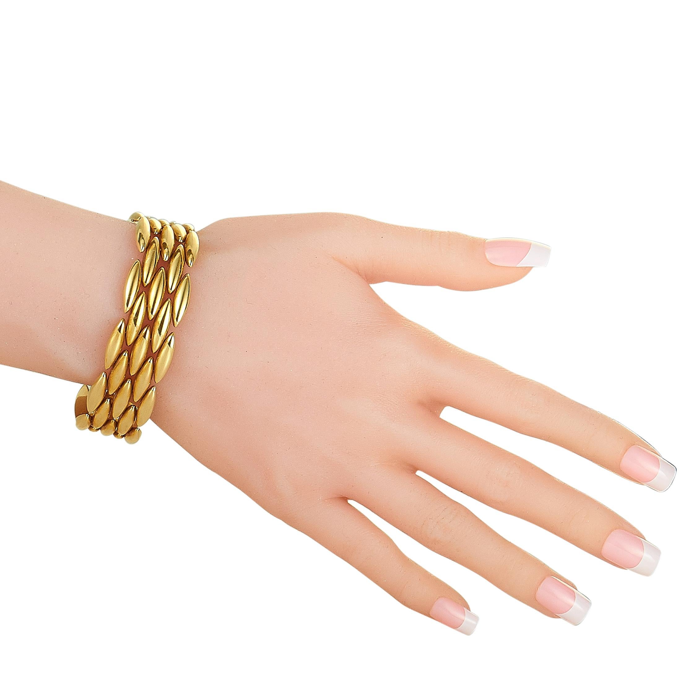 The Cartier “Maillon Panthère” bracelet is crafted from 18K yellow gold and weighs 48.6 grams, measuring 7” in length.

This jewelry piece is offered in estate condition and includes the manufacturer’s box.