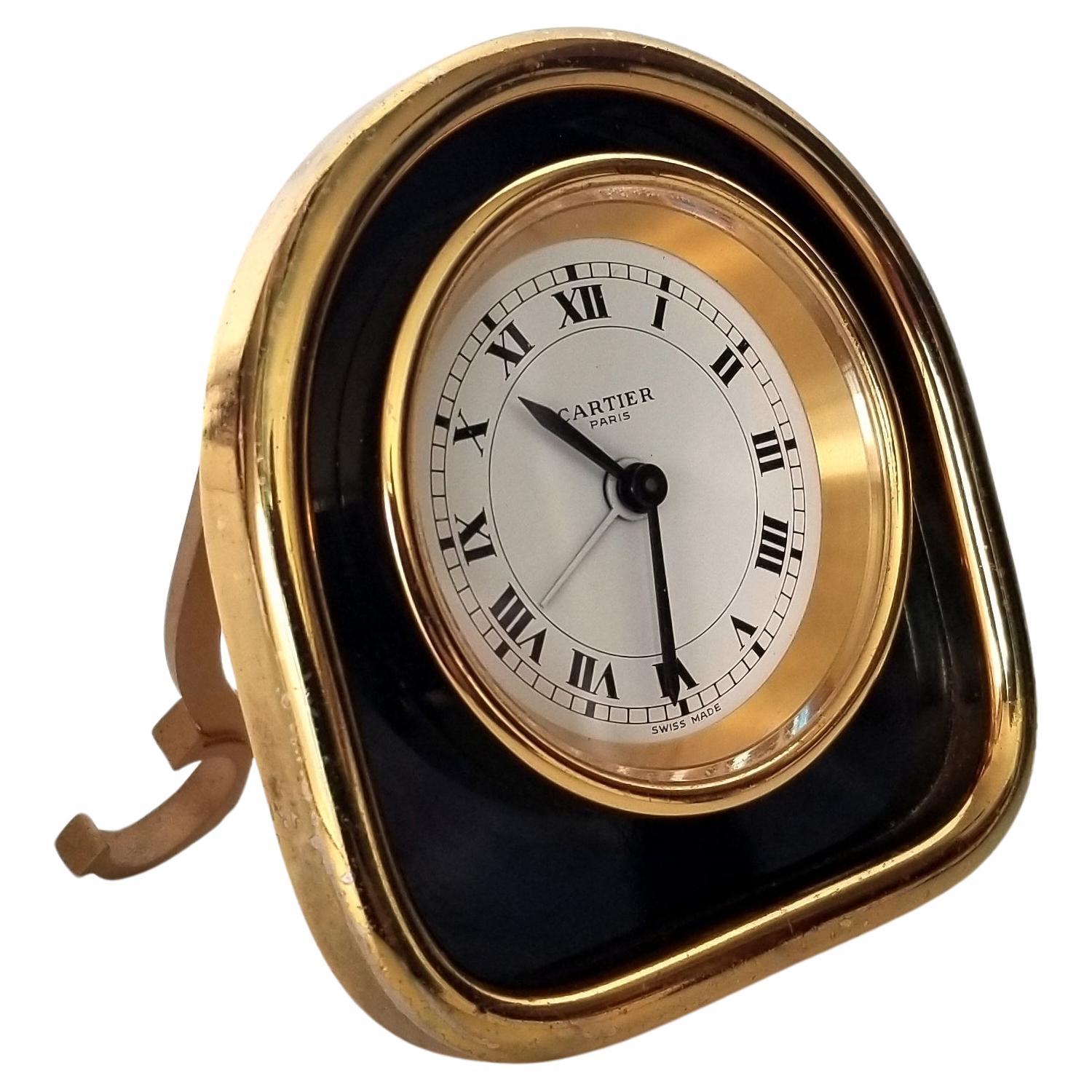 How does a mechanical alarm clock work?